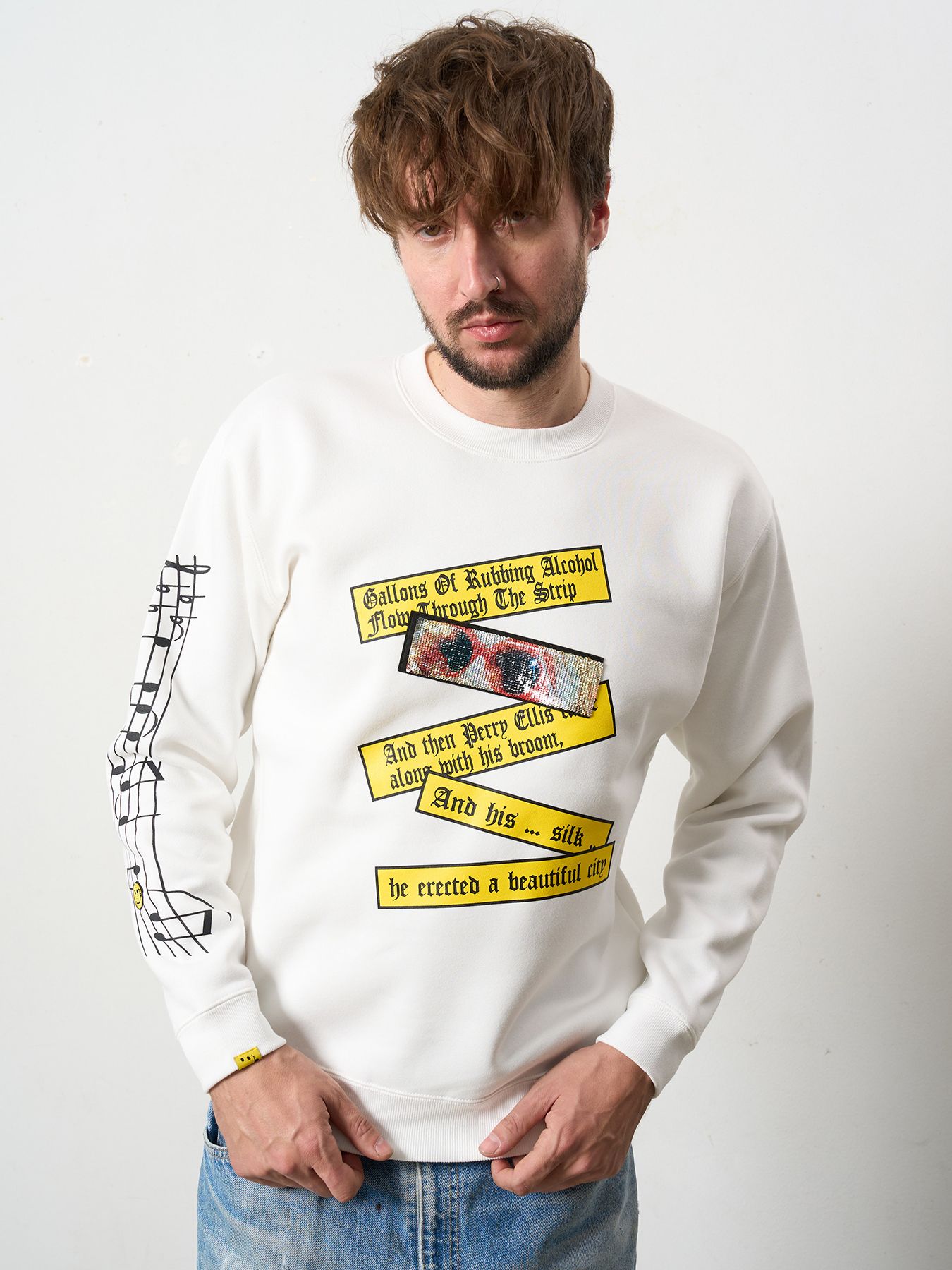 【予約品 5月8日(木) AM10時 締切】 TC裏毛起毛 リリック リボン シークインMUSICプリント スウェットシャツ / ホワイト