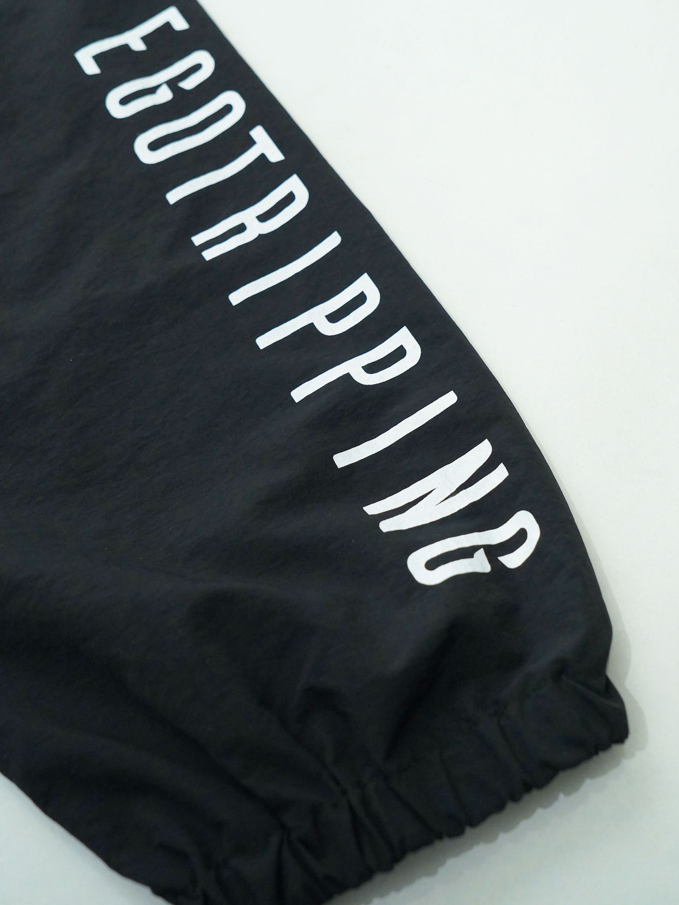 【予約品 7月5日(日) 締切】DAYGLYDE TRACKPANTS / ナイロンパンツ / ブラック