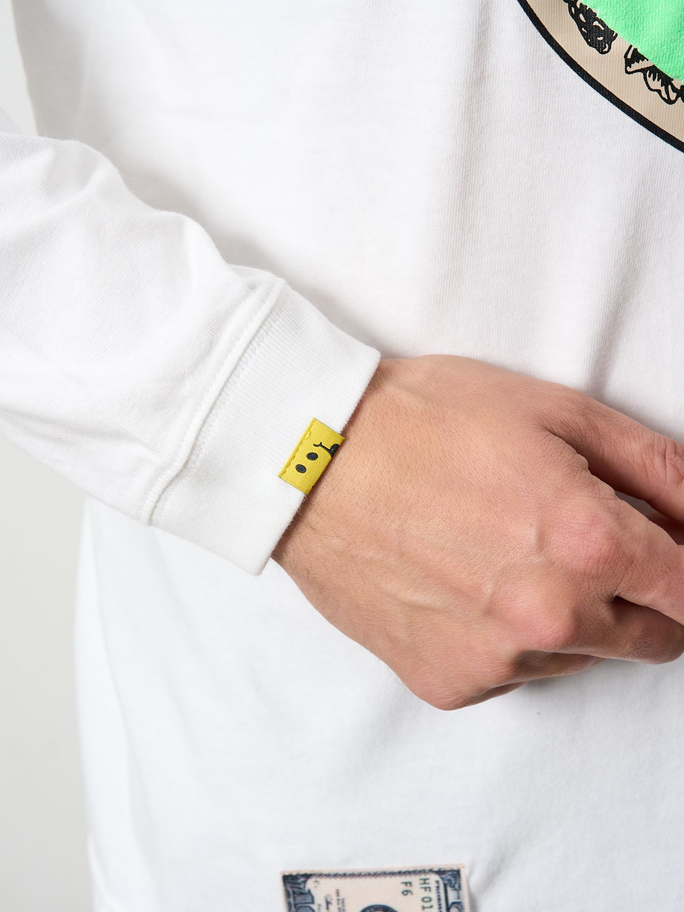 【予約品 5月8日(木) AM10時 締切】 5.6ozコットン天竺 ラベルスマイル発泡プリントLS Tシャツ / ホワイト