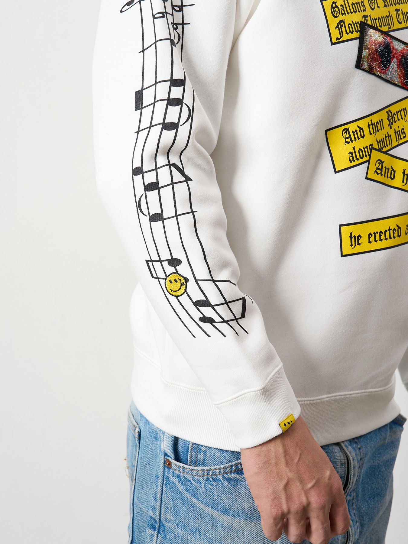 【予約品 5月8日(木) AM10時 締切】 TC裏毛起毛 リリック リボン シークインMUSICプリント スウェットシャツ / ホワイト