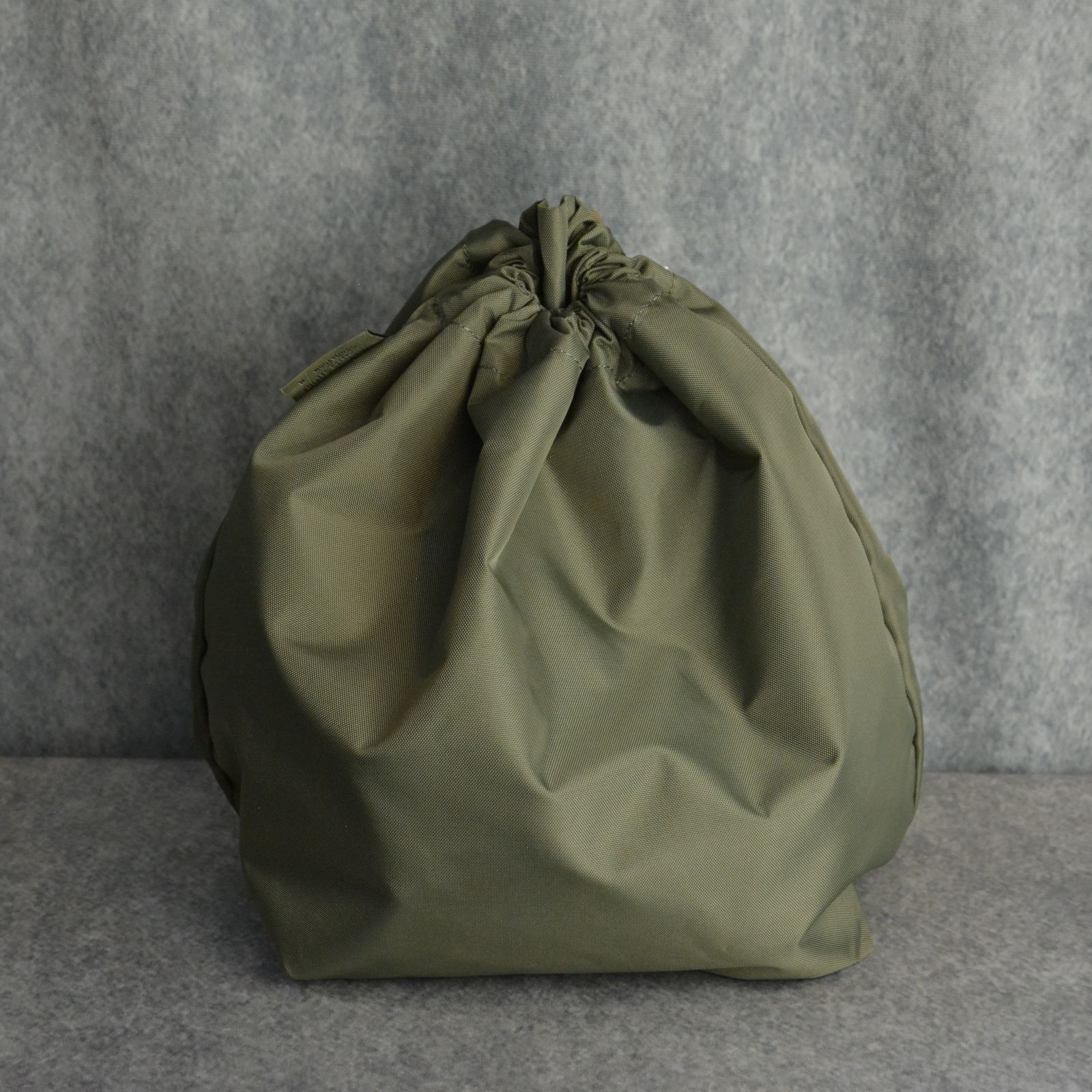 N.HOOLYWOOD - × OUTDOOR PRODUCTS DRAWSTRING BAG （KHAKI） / ナイロン バッグ （カーキ） |  chord online store