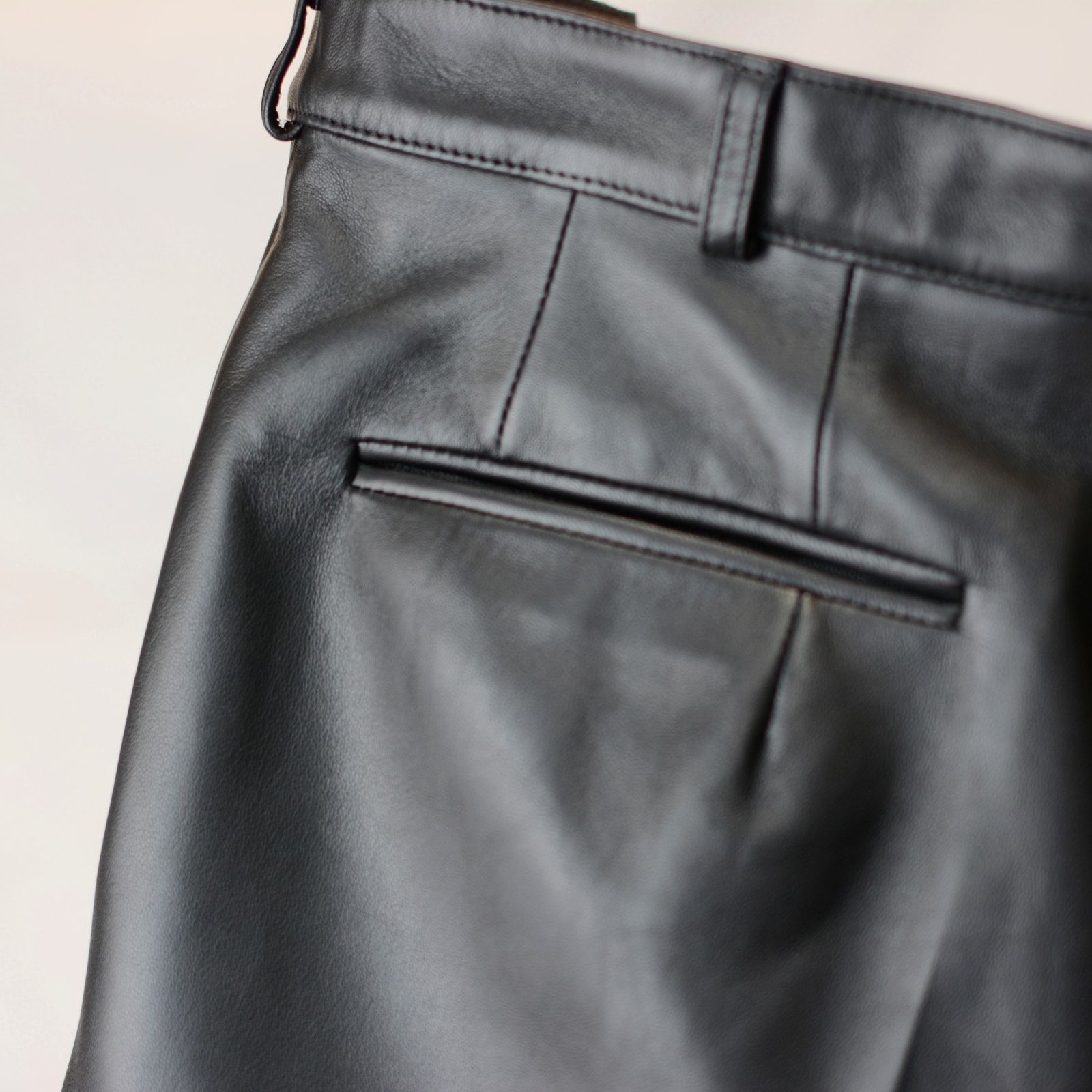 Leather tuck shorts