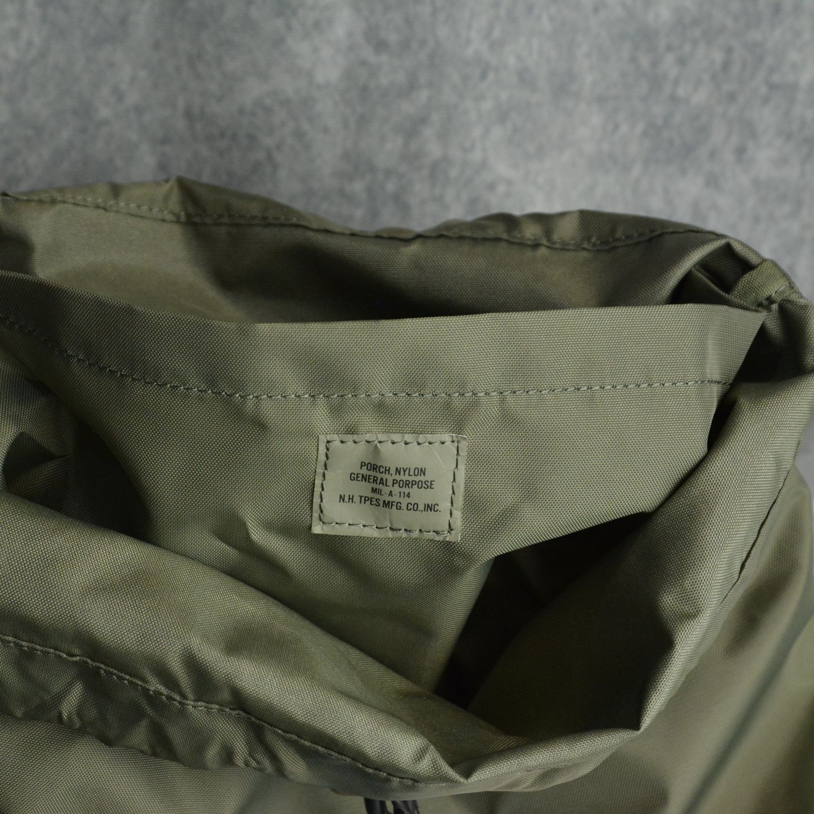 × OUTDOOR PRODUCTS DRAWSTRING BAG （KHAKI） / ナイロン バッグ （カーキ）