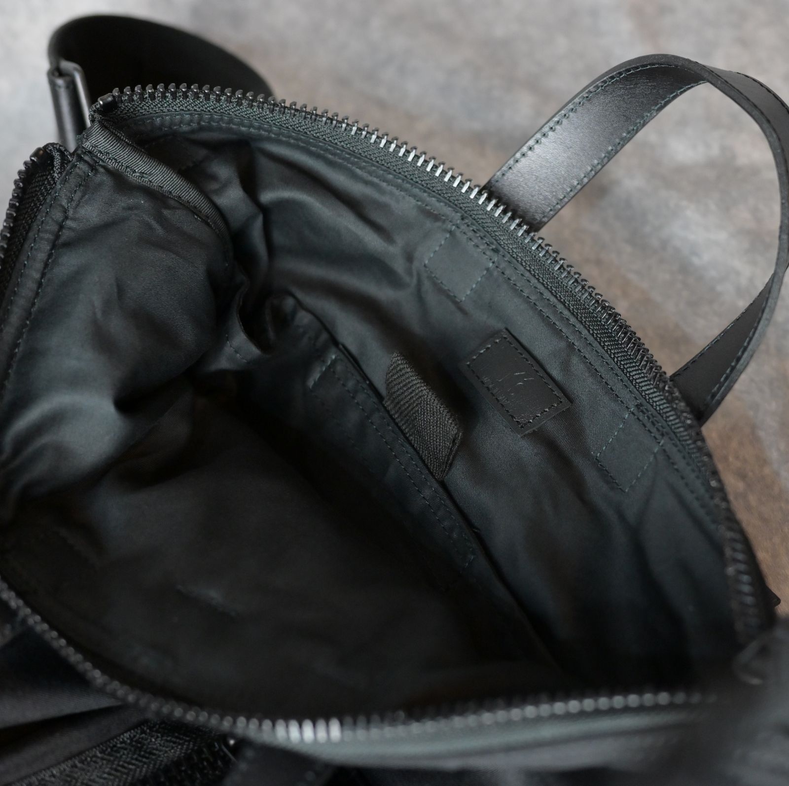 WOOL GABARDINE HELMET BAG （BLACK） /  ウールギャバ ヘルメット バッグ （ブラック）