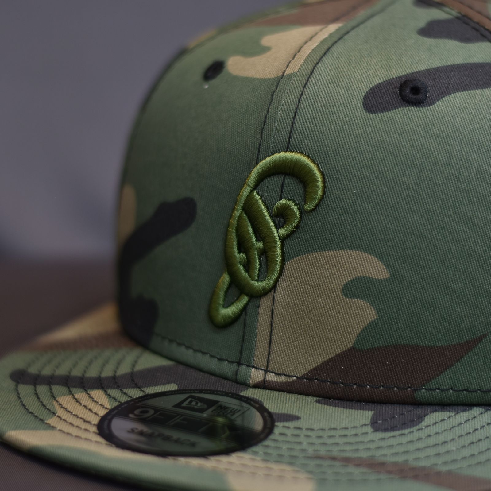 NEWERA 9FIFTY SNAPBACK ”d”  LOGO CAP (CAMO×KHAKI) / ニューエラ スナップバック ロゴ キャップ