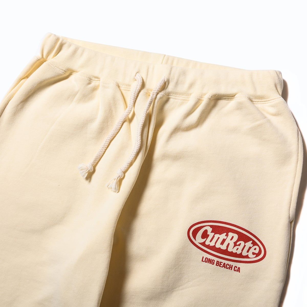 CUTRATE LOGO OMW SWEAT PANTS (IVORY)