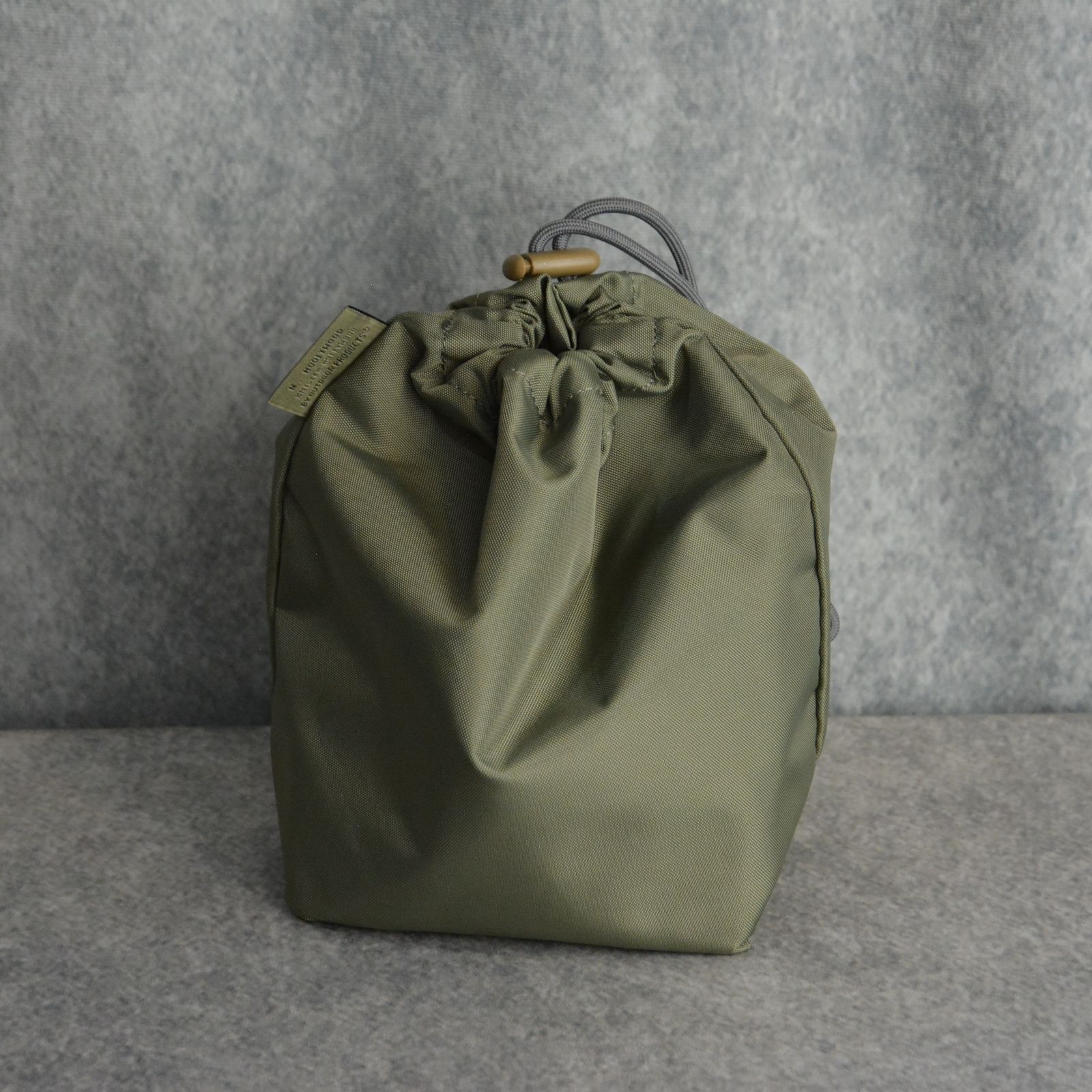 × OUTDOOR PRODUCTS DRAWSTRING BAG （KHAKI） / ナイロン バッグ （カーキ）