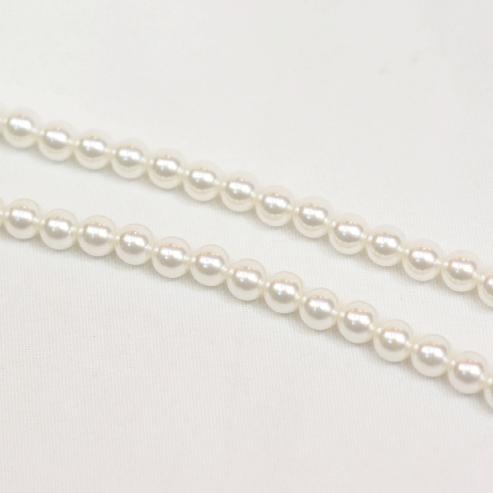 PEARL MASK HOLDER"