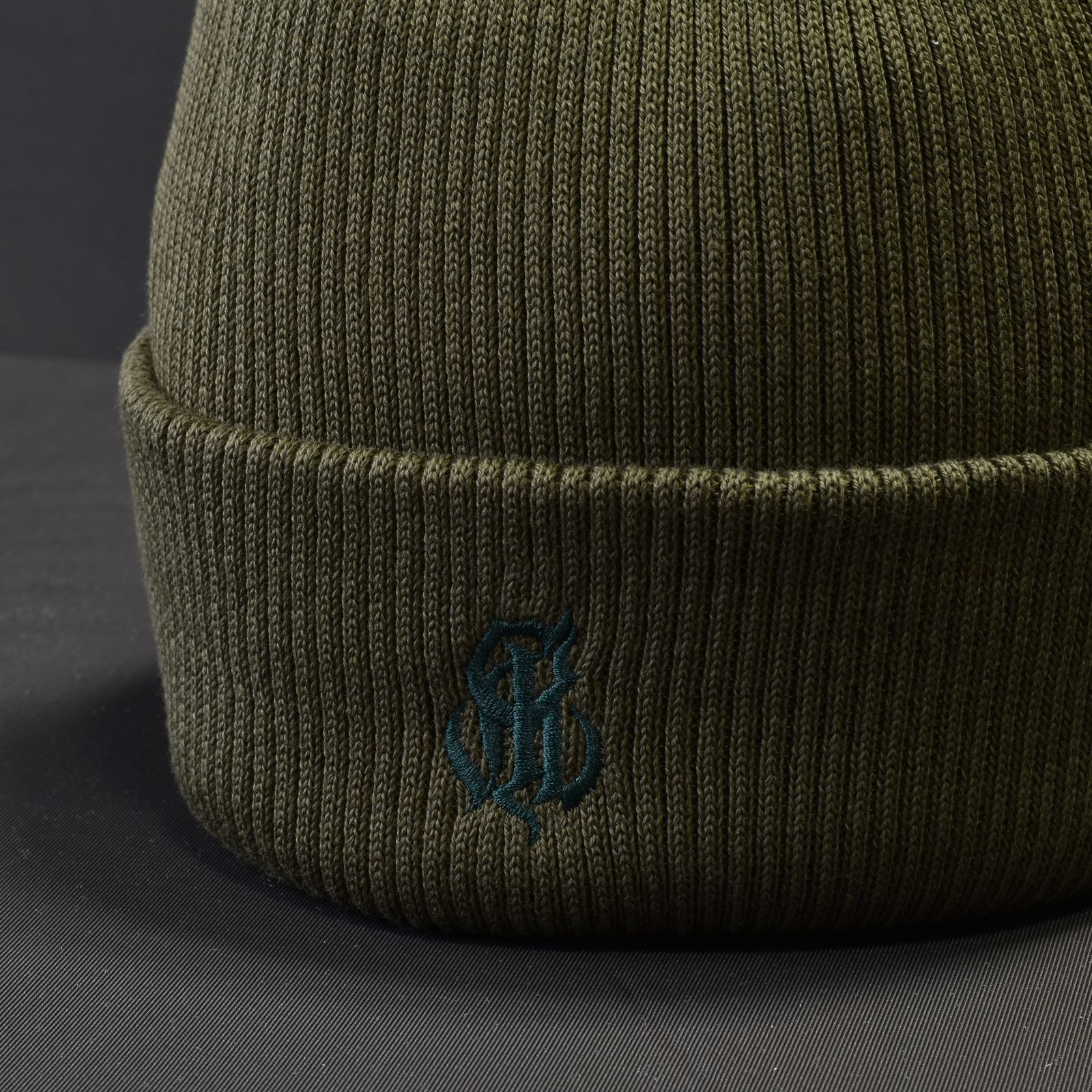 CAL NT LOGO KNIT CAP (OLIVE) / ロゴ ニットキャップ