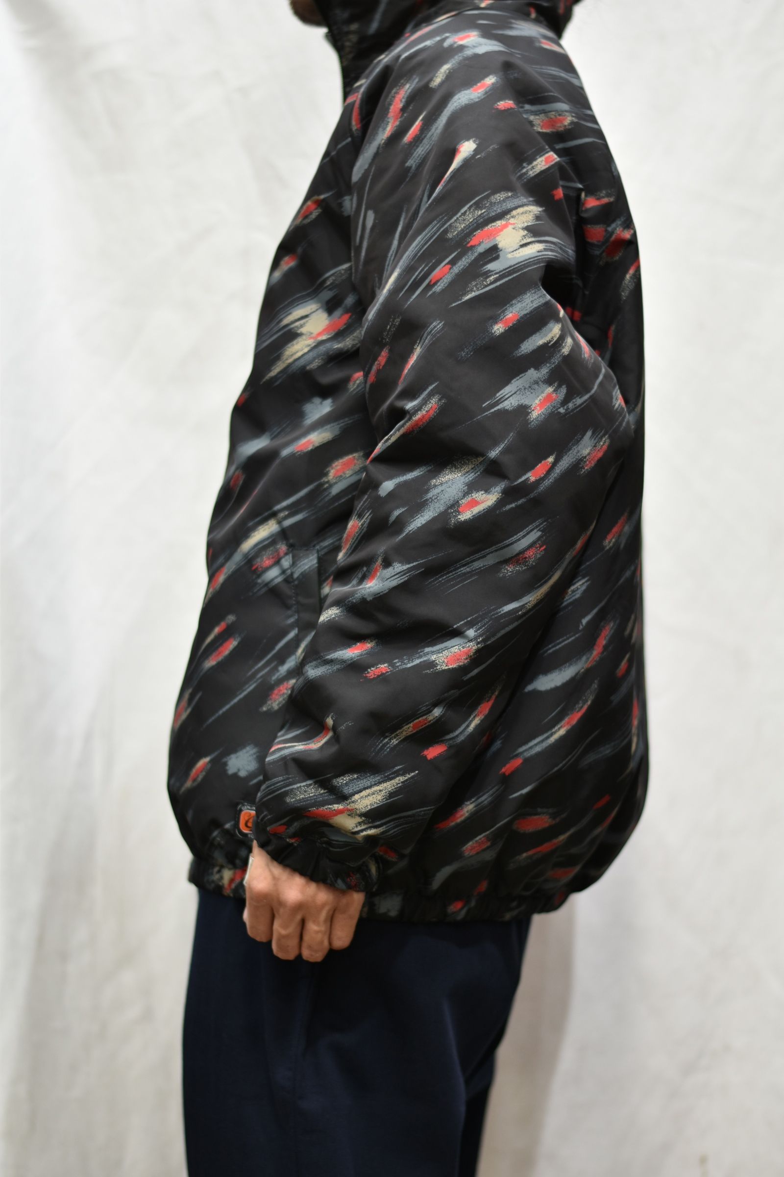 WATER REPELLENT TASSER ALLOVER PATTERN TRACK JACKET (BLACK)