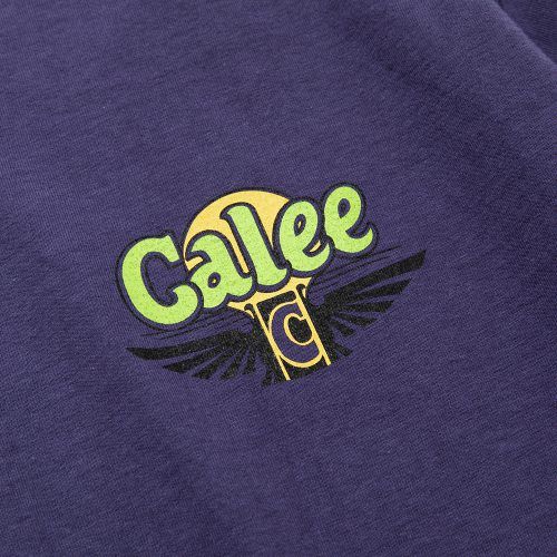 BINDER NECK CALEE WING LOGO VINTAGE T‐SHIRT (DARK PURPLE) / バインダーネック プリントTシャツ