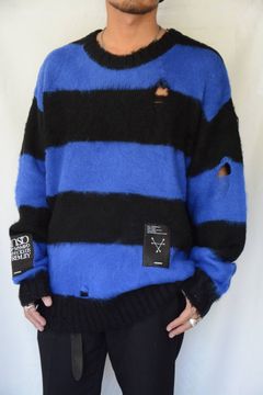 DAMAGE KNIT”