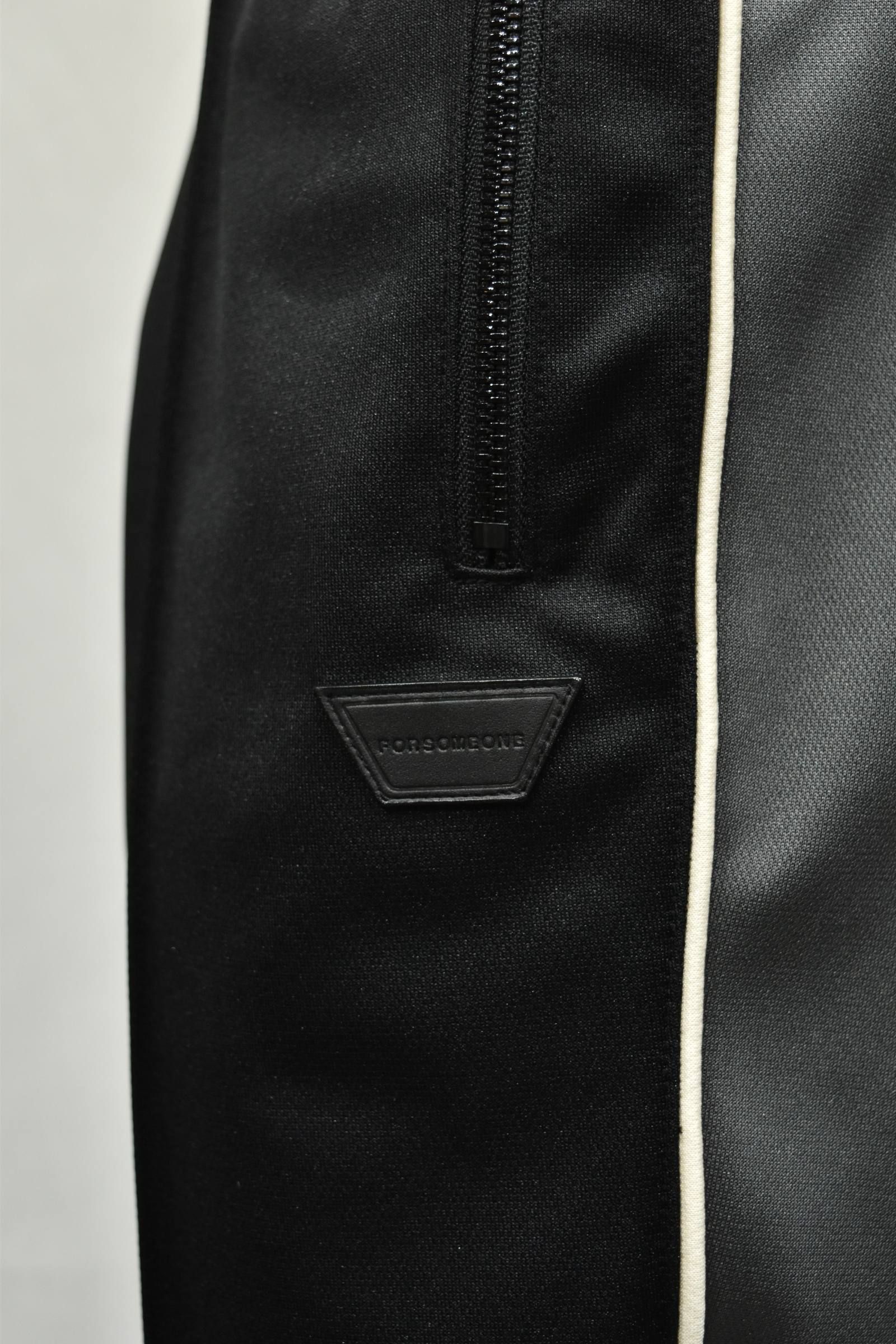 TRACK TROUSERS"