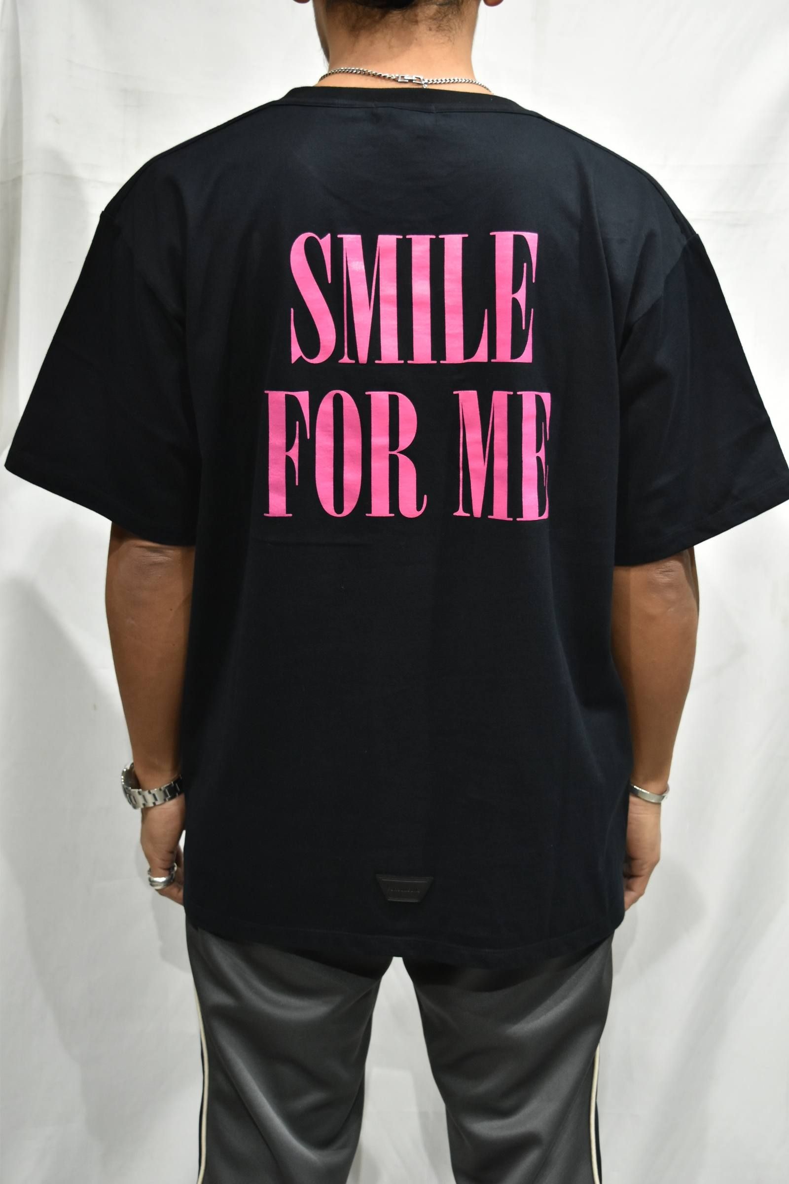 SMILE T"
