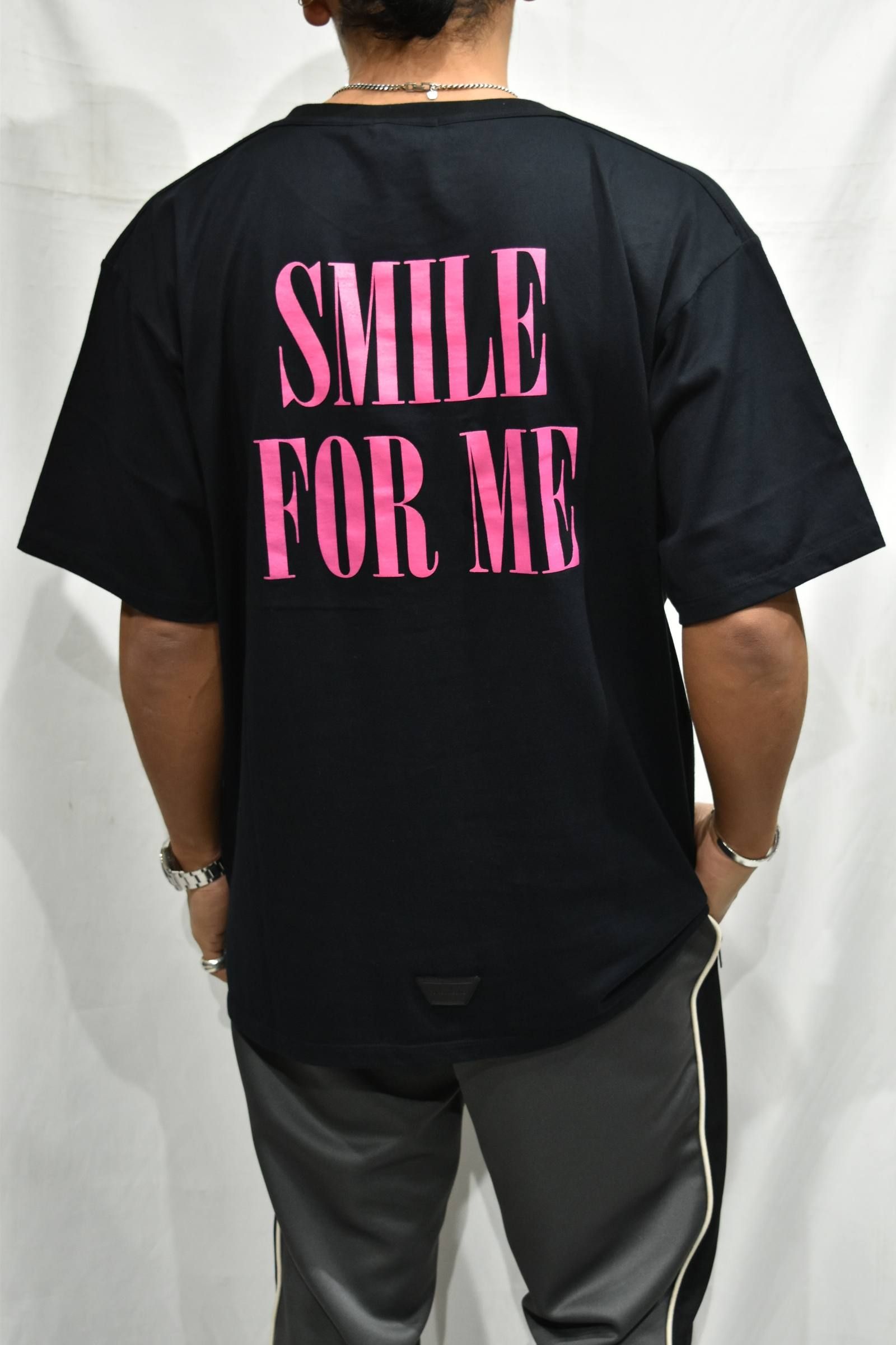 SMILE T"