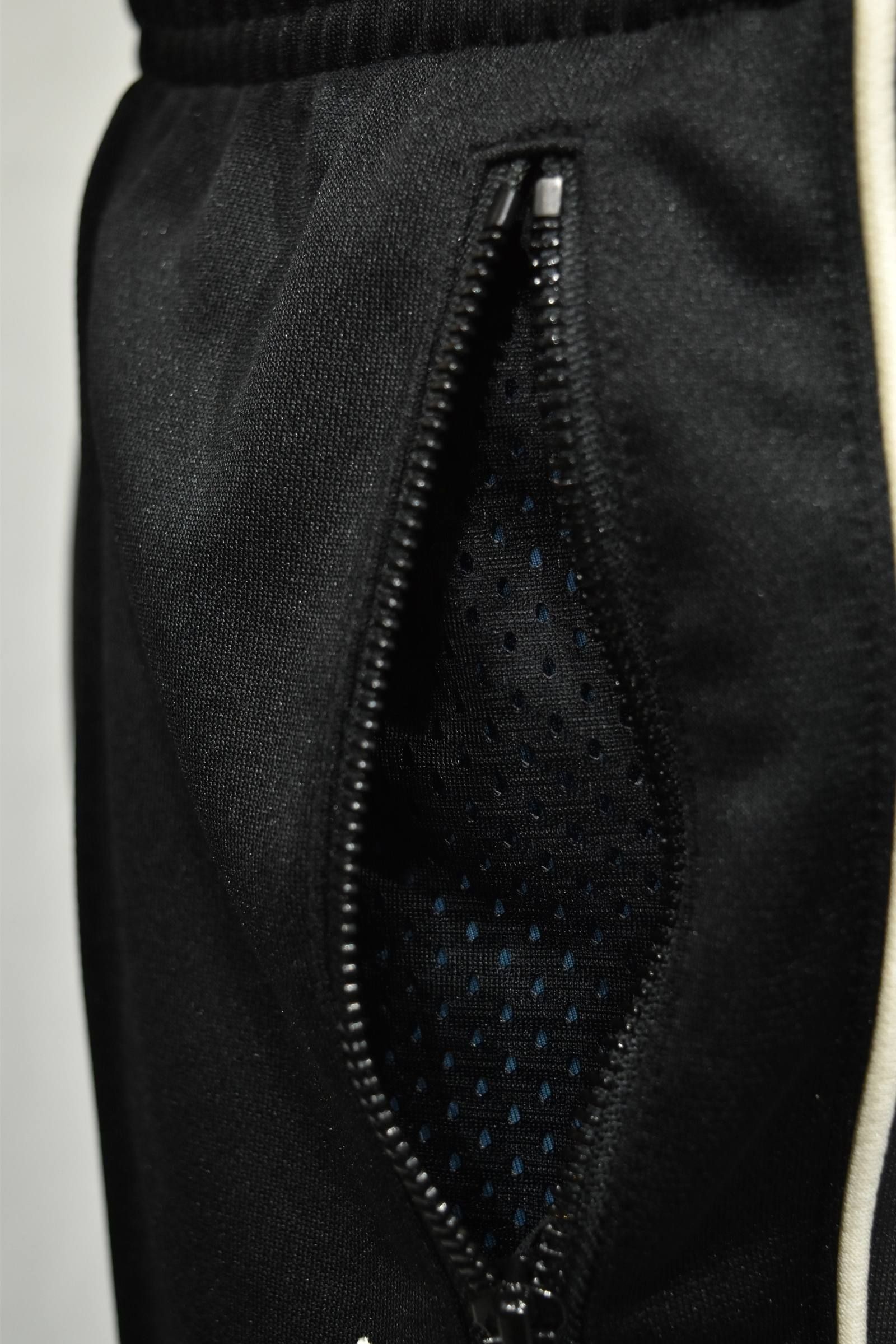 TRACK TROUSERS"