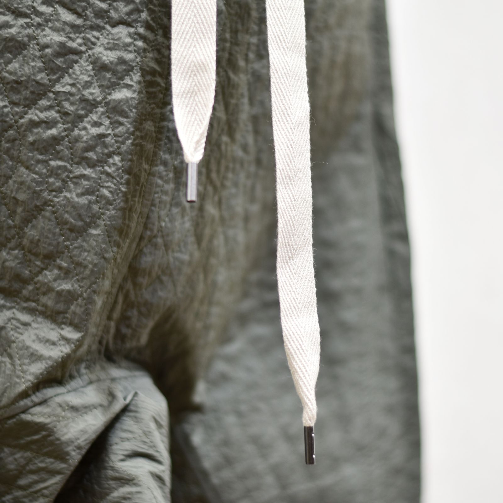 quilting passive pants (KHAKI GRAY) / キルティング パッシブ パンツ