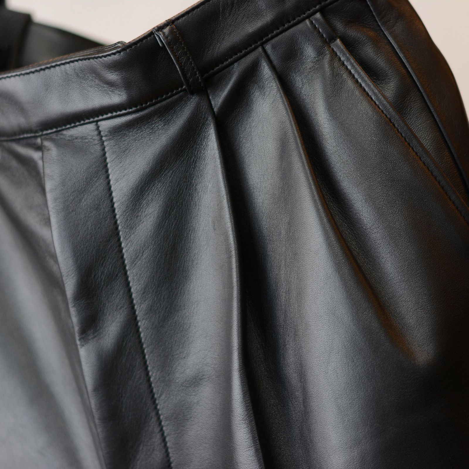 Leather tuck shorts
