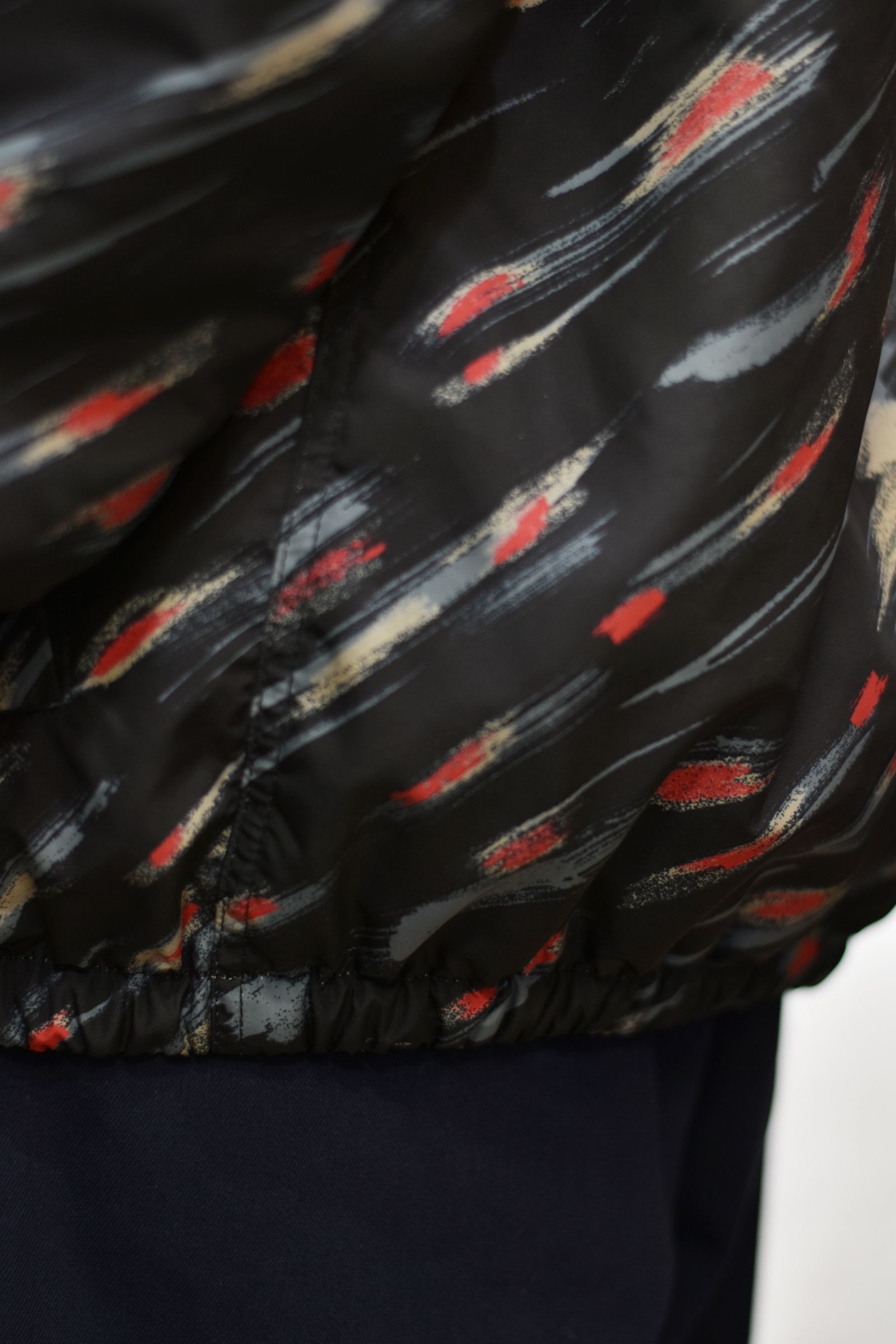 WATER REPELLENT TASSER ALLOVER PATTERN TRACK JACKET (BLACK)