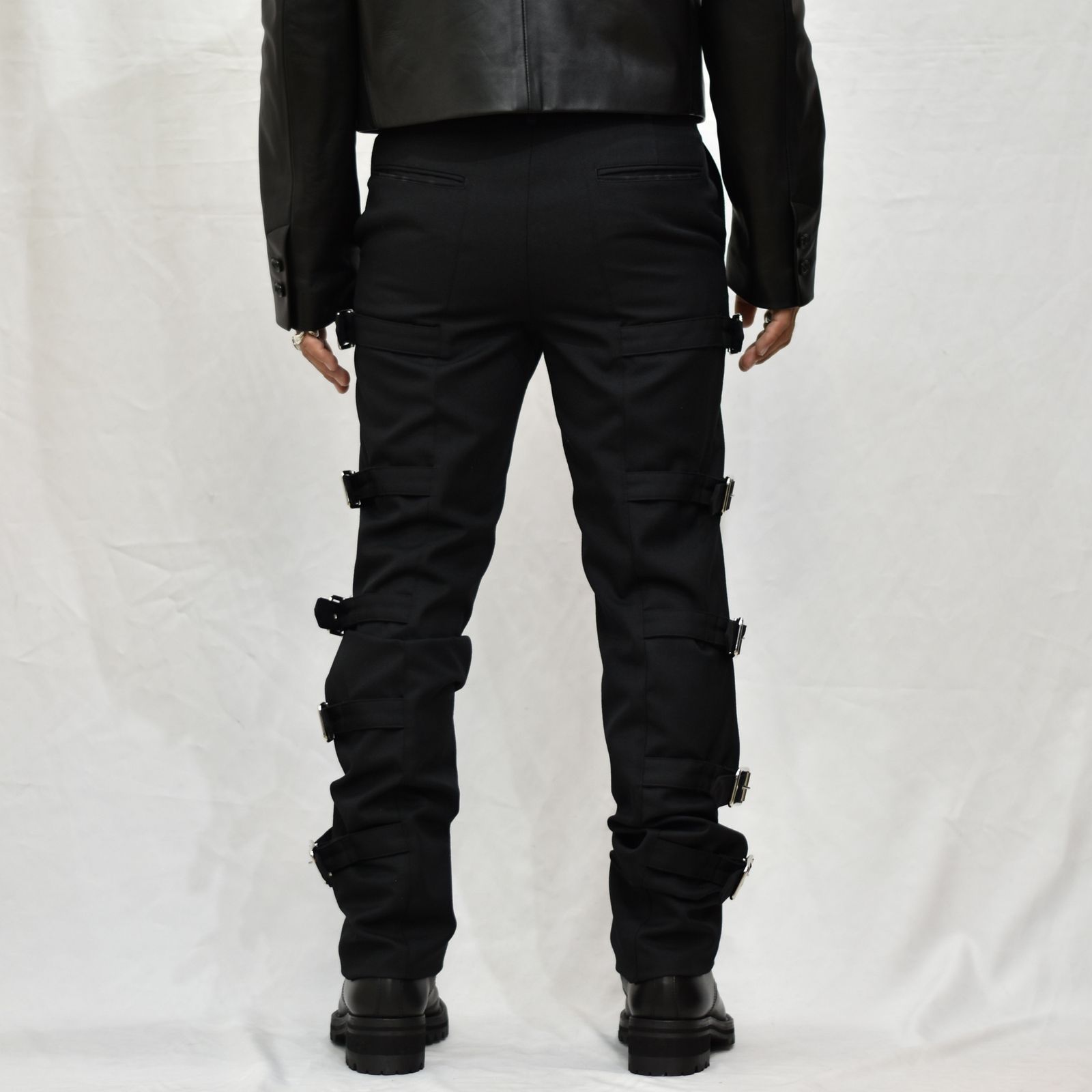 Wool gabardine bondage trousers ”