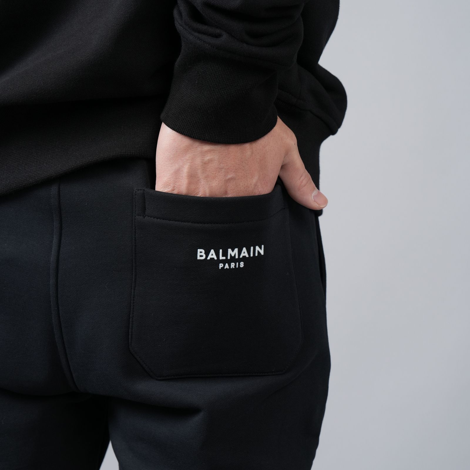 BALMAIN - RIBBED BALMAIN FLOCK SWEATPANTS / リベッド バルマン