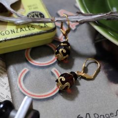 「クリアカットラウンドボタニカル」ピアス フランス