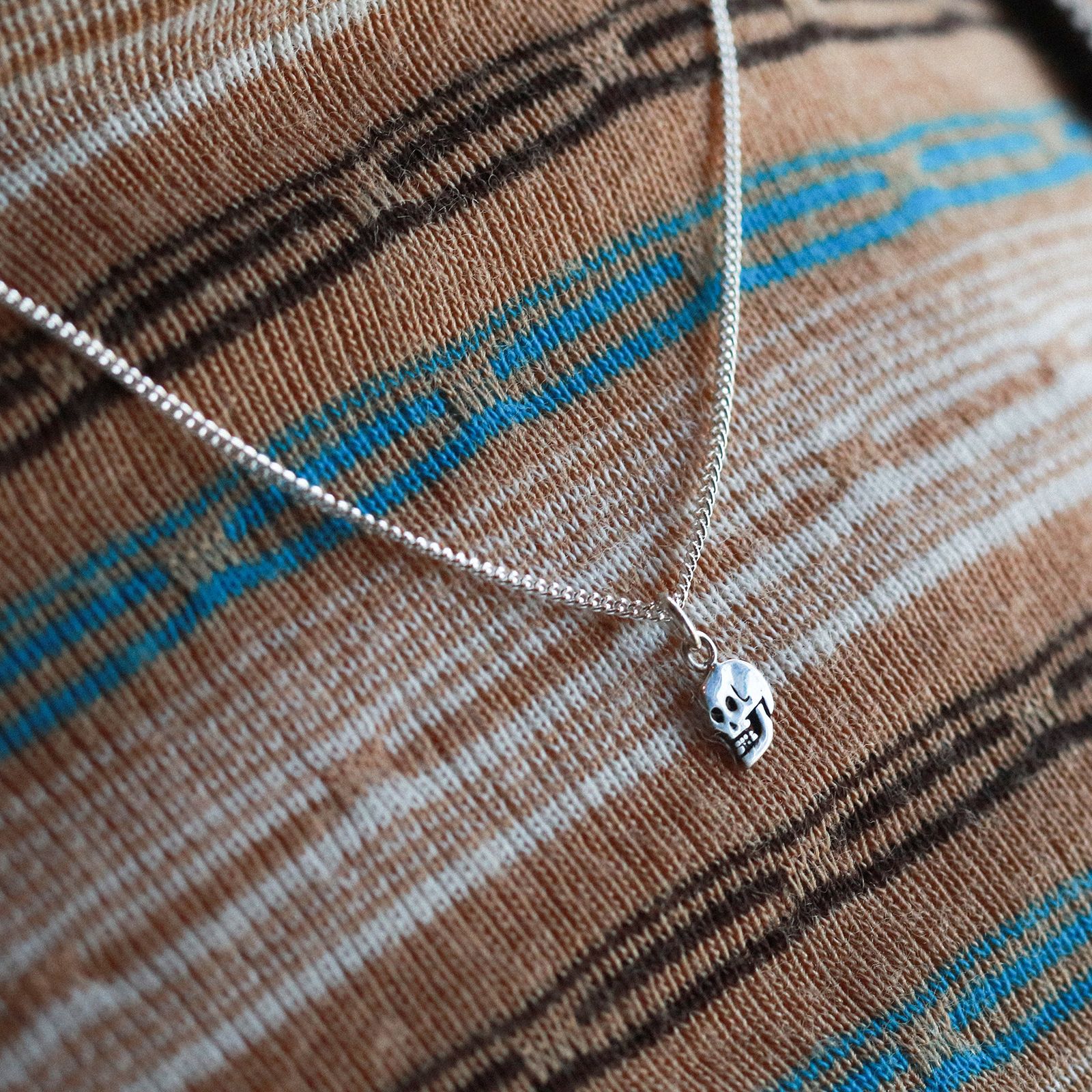 「Teeny Tiny Nutter Skull Necklace」ネックレス