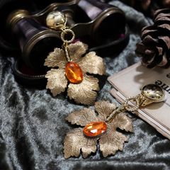 「リーフオンビジュー」イヤリング オレンジ