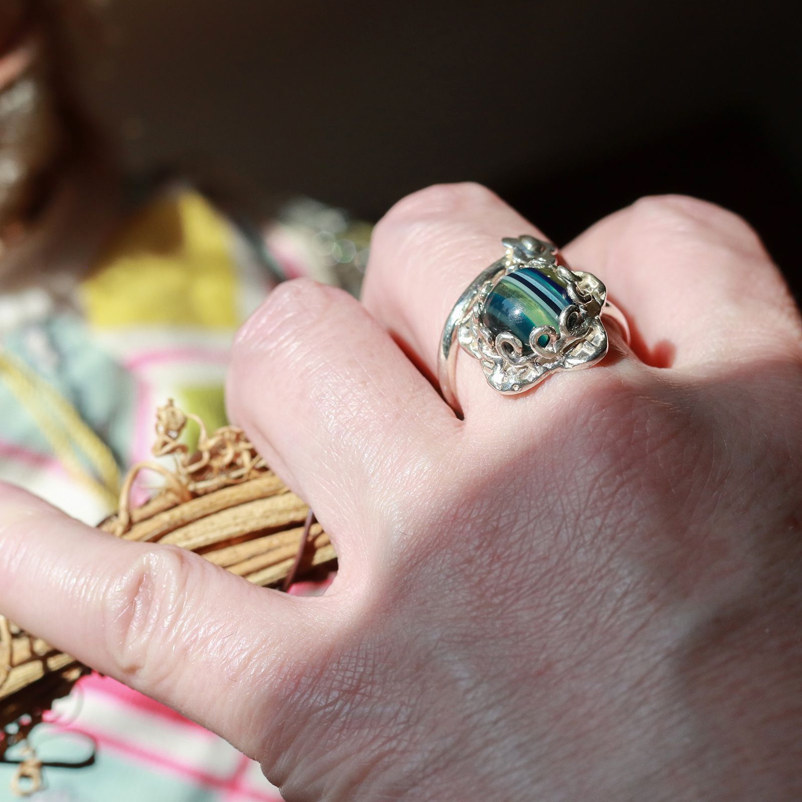 「SPIRAL FLOWER RING SURFITE」リング