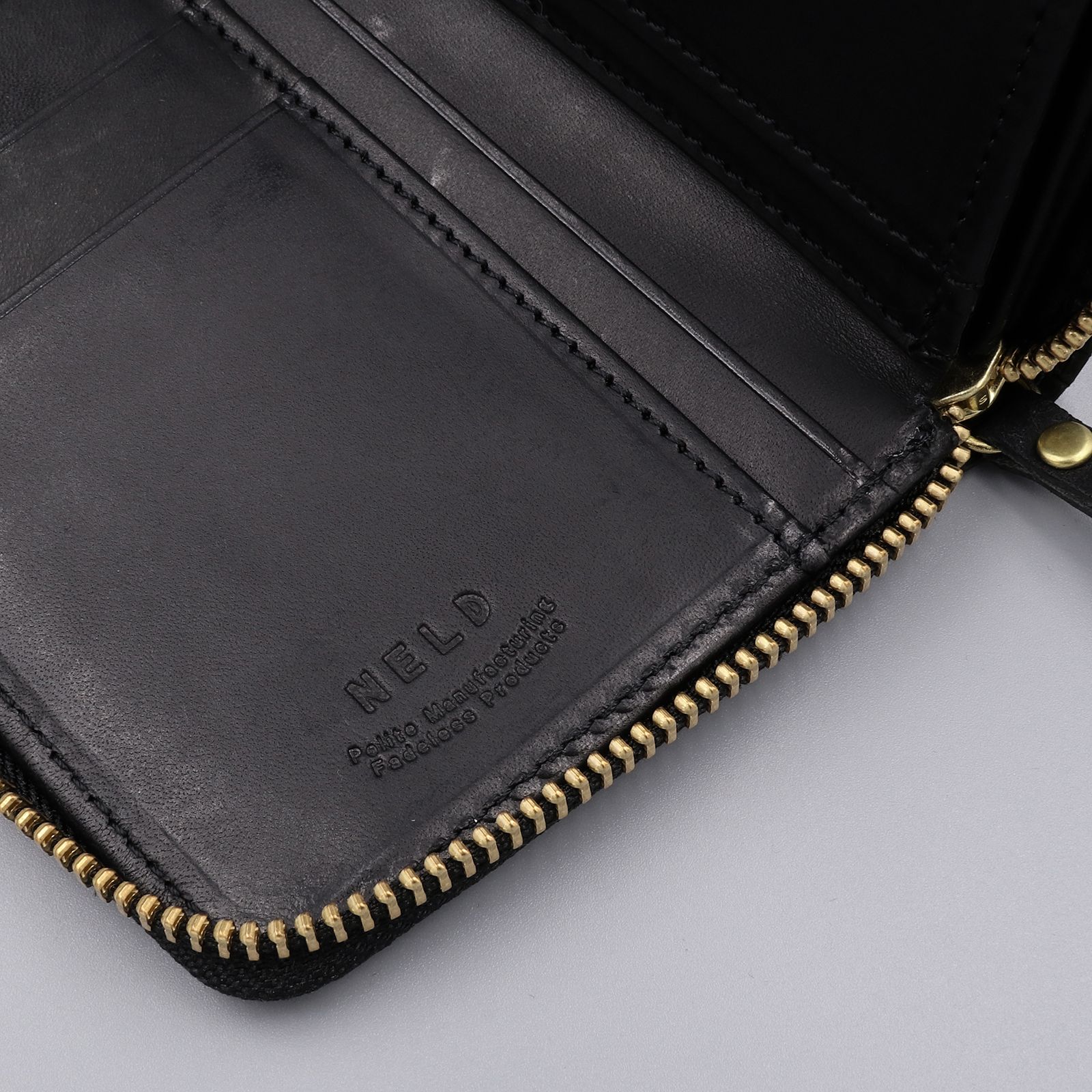 「LIZARD」ラウンド長財布