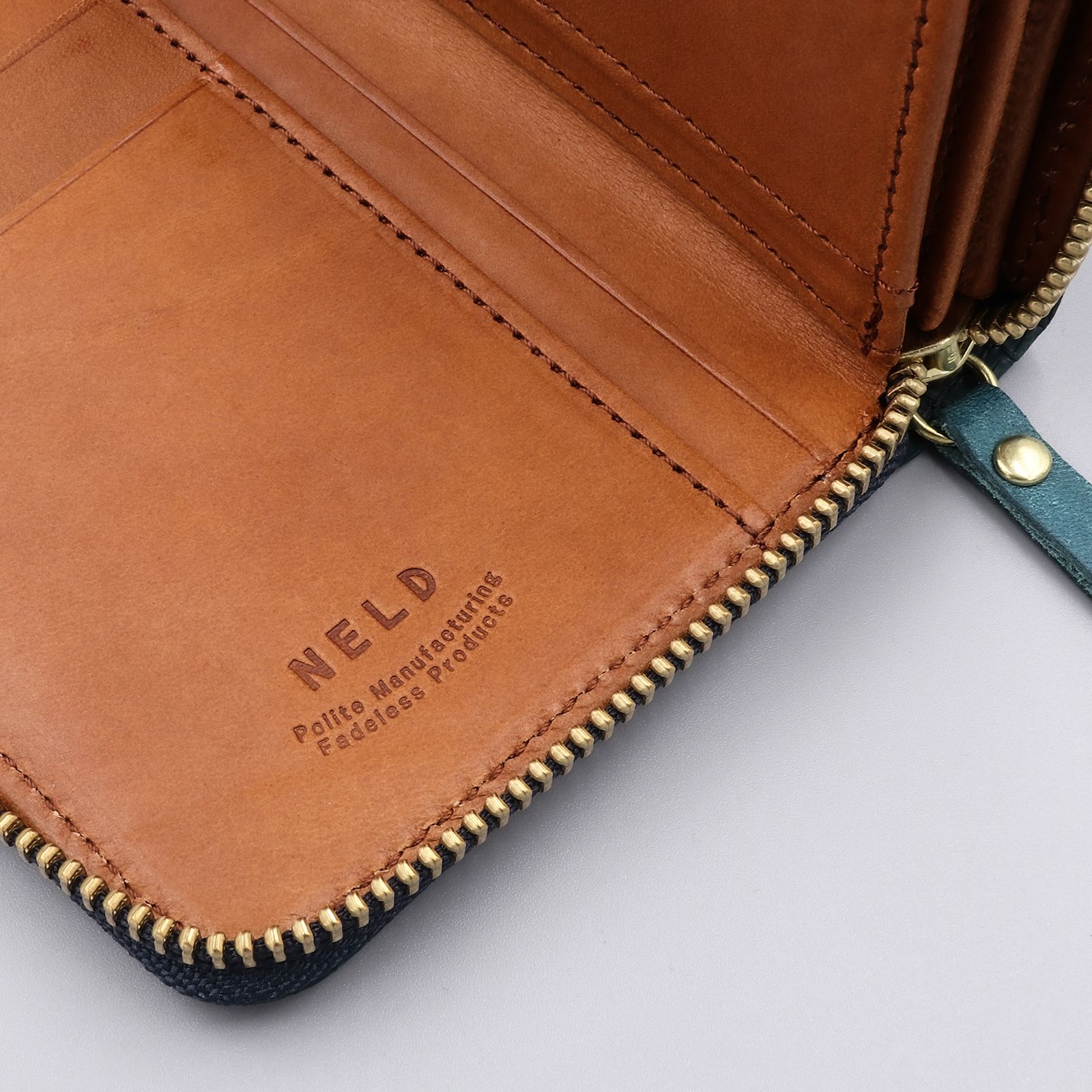 「LIZARD」ラウンド長財布