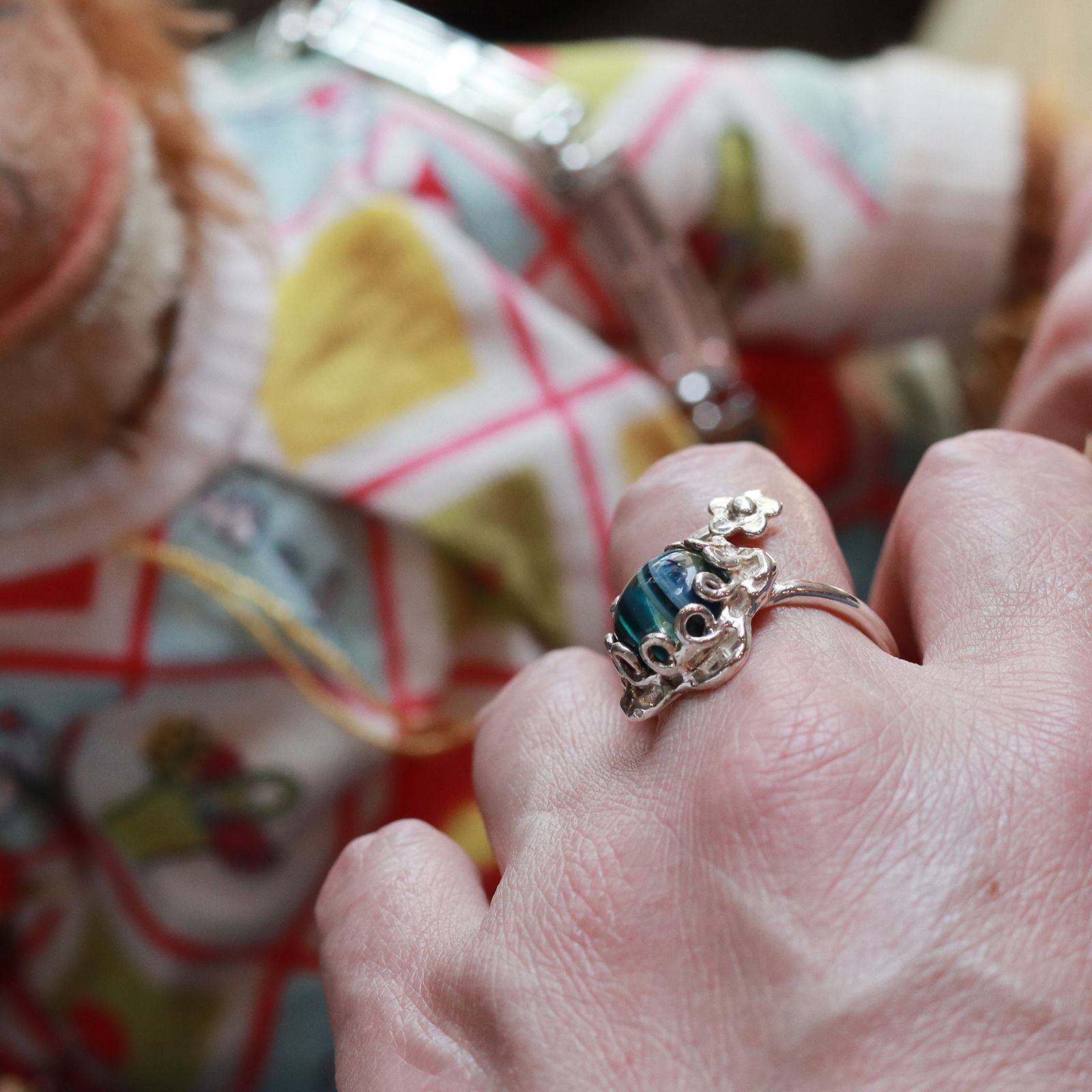 「SPIRAL FLOWER RING SURFITE」リング