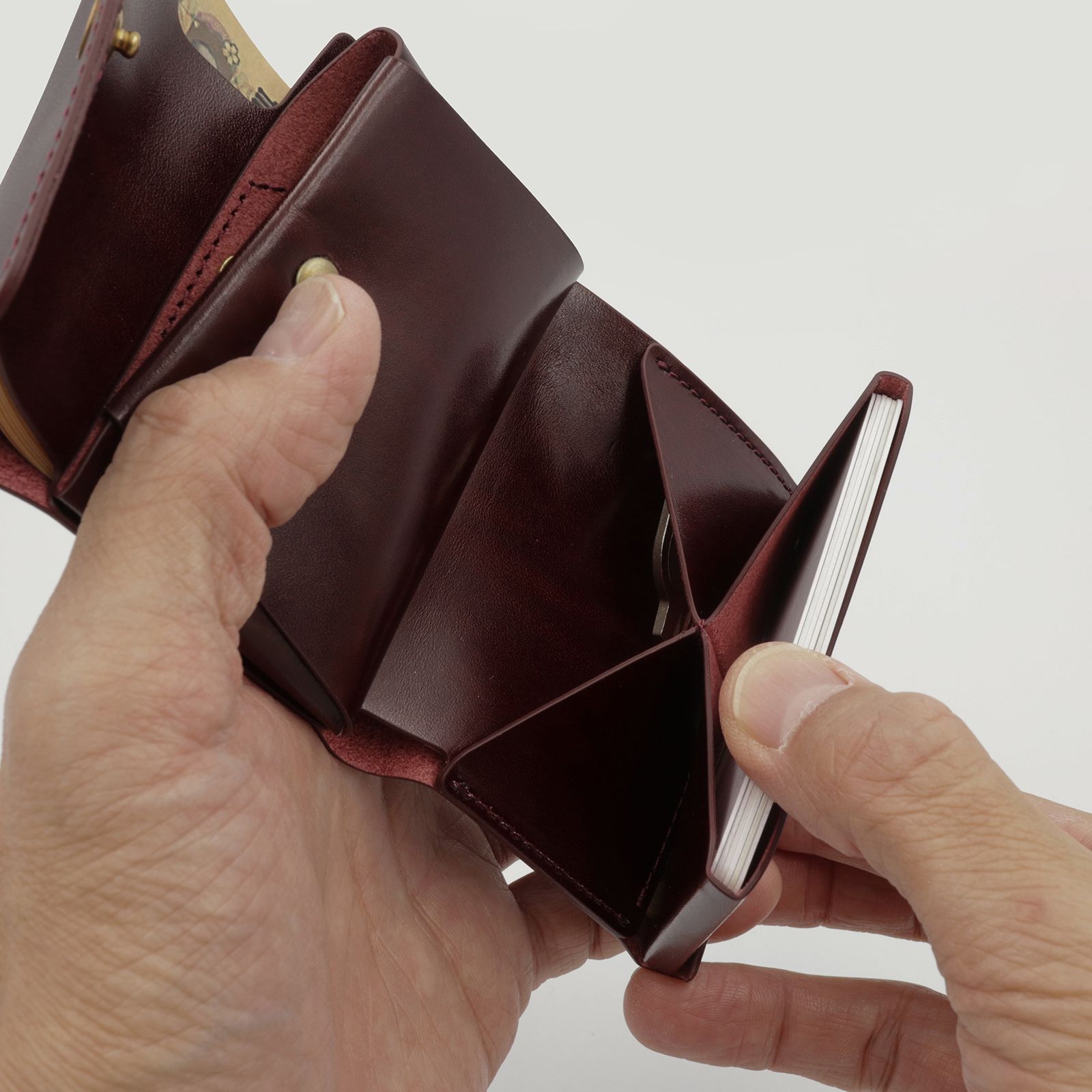 「三つ折りミニ財布PALUMO Rugato」black