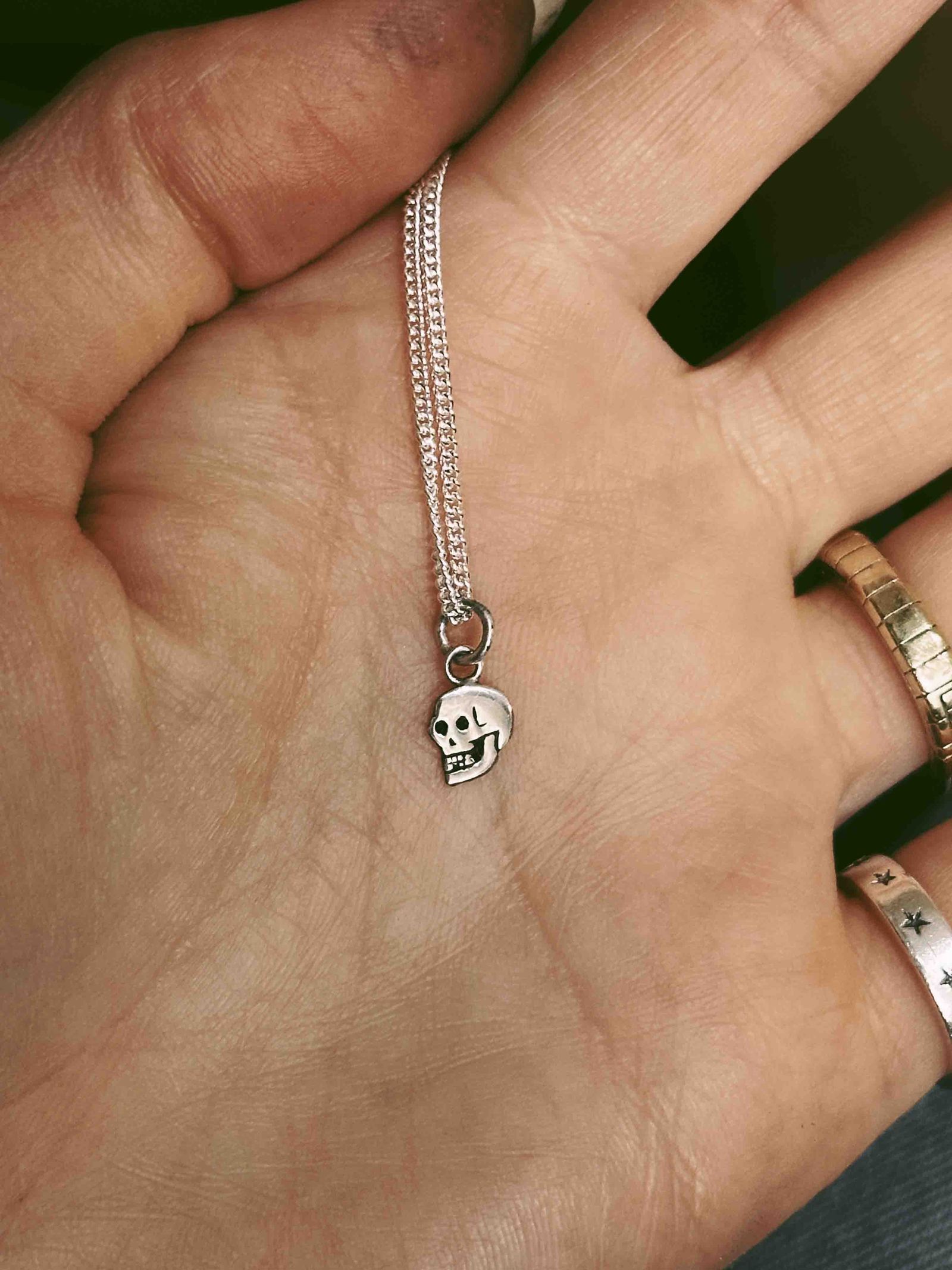 「Teeny Tiny Nutter Skull Necklace」ネックレス