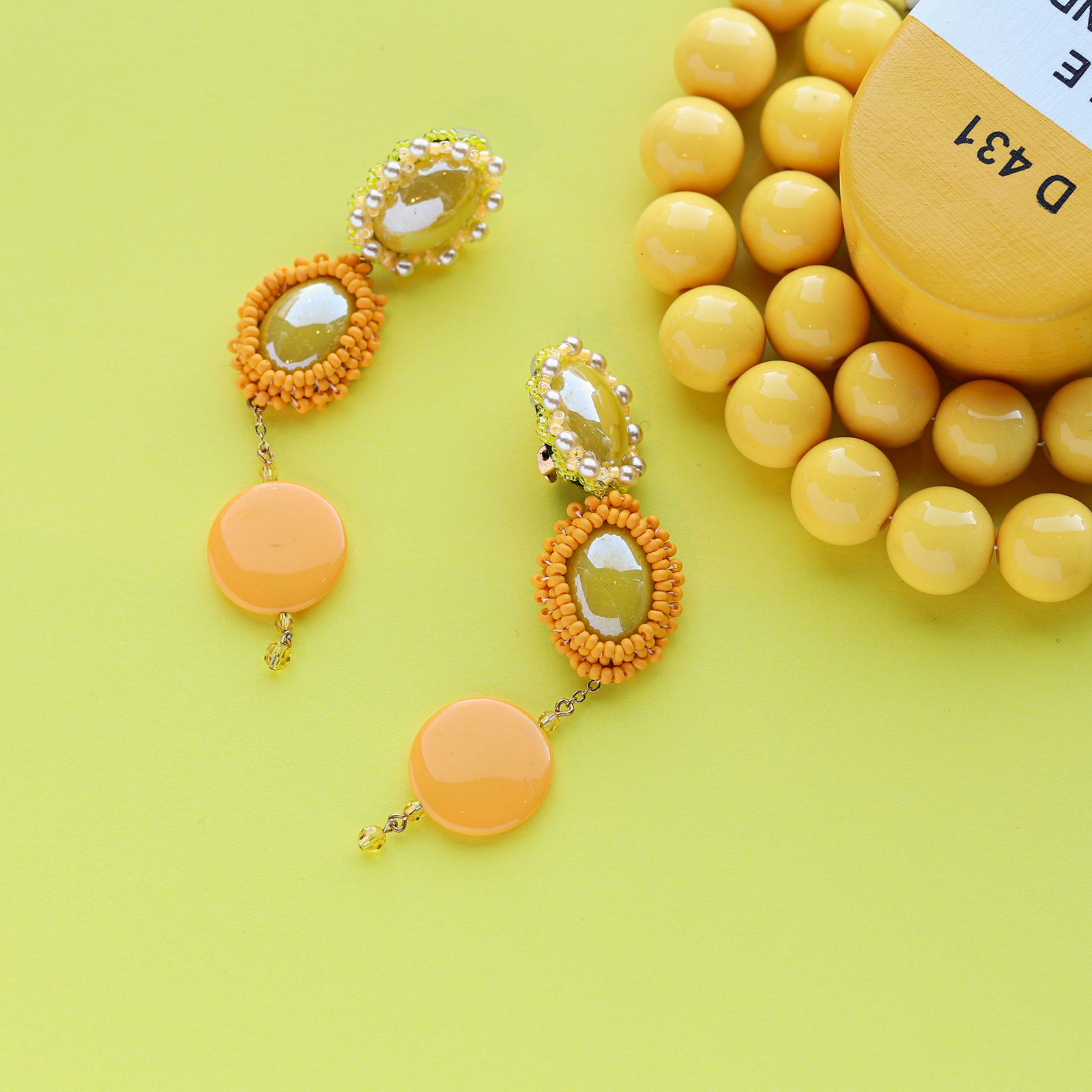 「Oval」イヤリング イエロー【collection de couleurs de sachikoism】