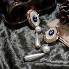「オーバルフレームインフラワー」イヤリング