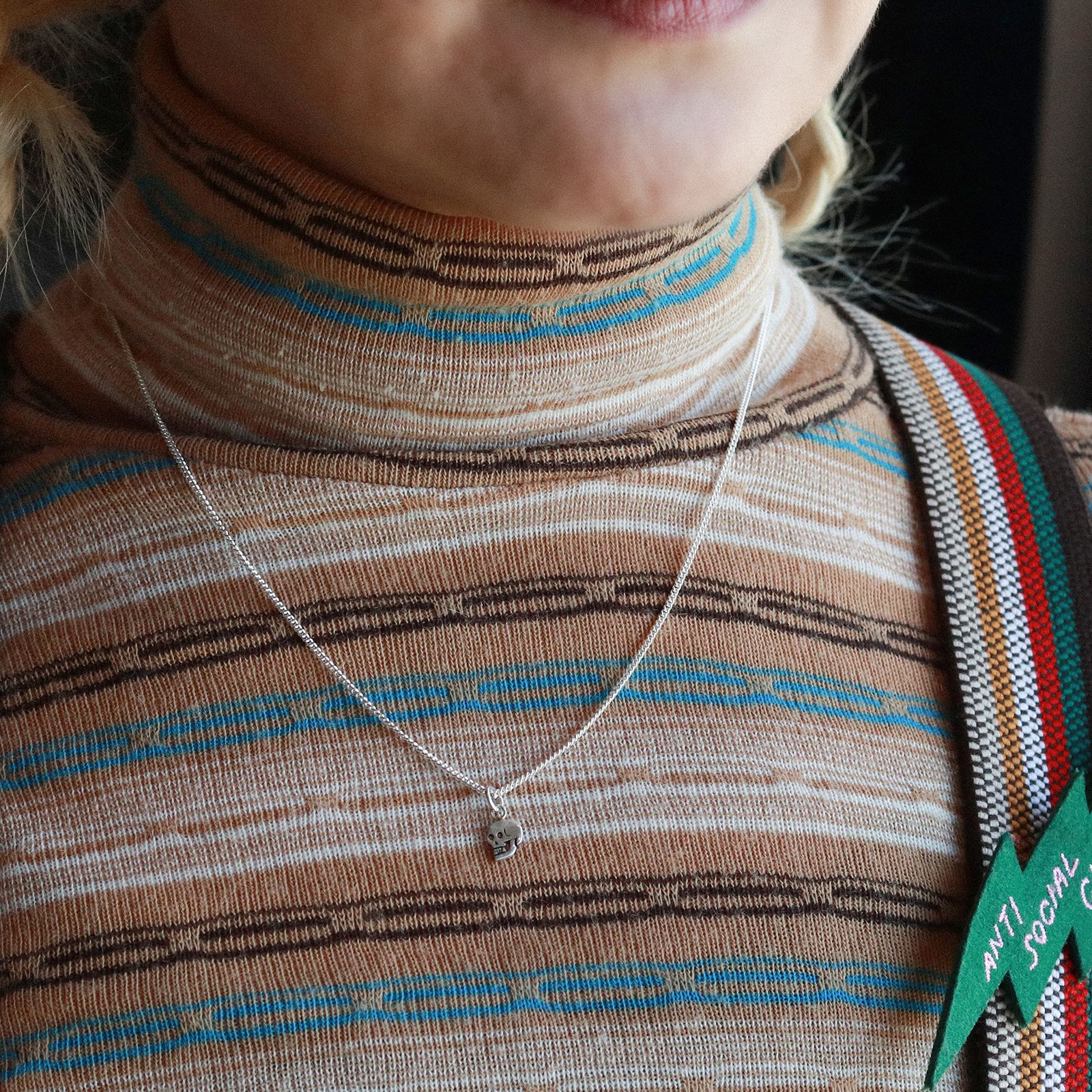 「Teeny Tiny Nutter Skull Necklace」ネックレス