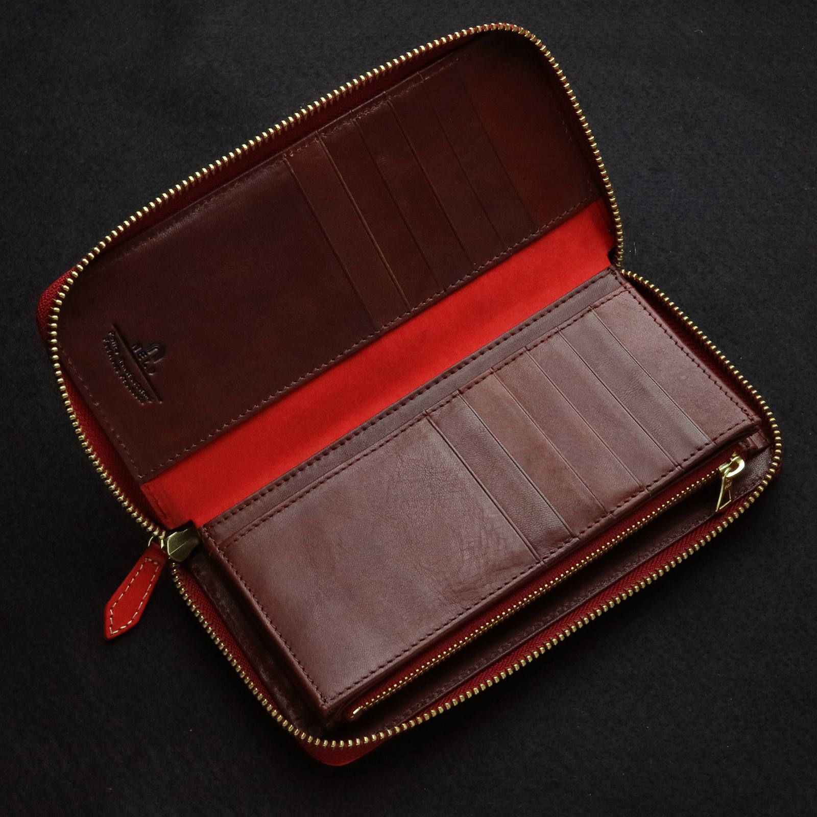 「PUEBRO」 ラウンドジップ長財布/レッド