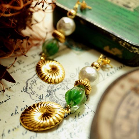 「ブラブララウンド&オーバルラインドゴールドプレート」ピアス フランス