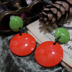 「シェイクポップサークル」イヤリング オレンジ×グリーン