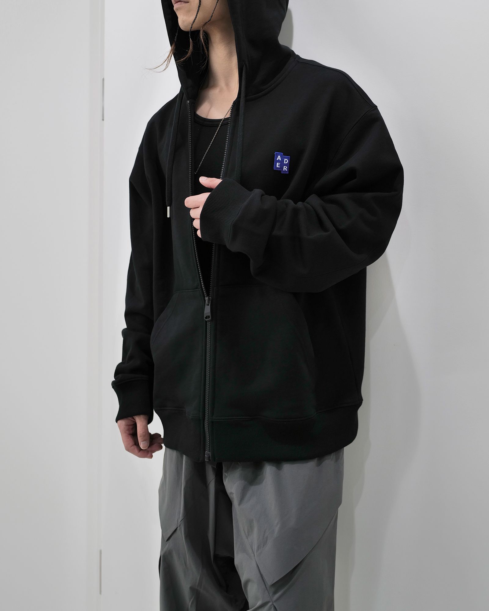 Ader Error - TRS TAG HOODIE ZIP-UP/BMSGFYHD0401BK/ジップアップパーカー/BLACK | Detail