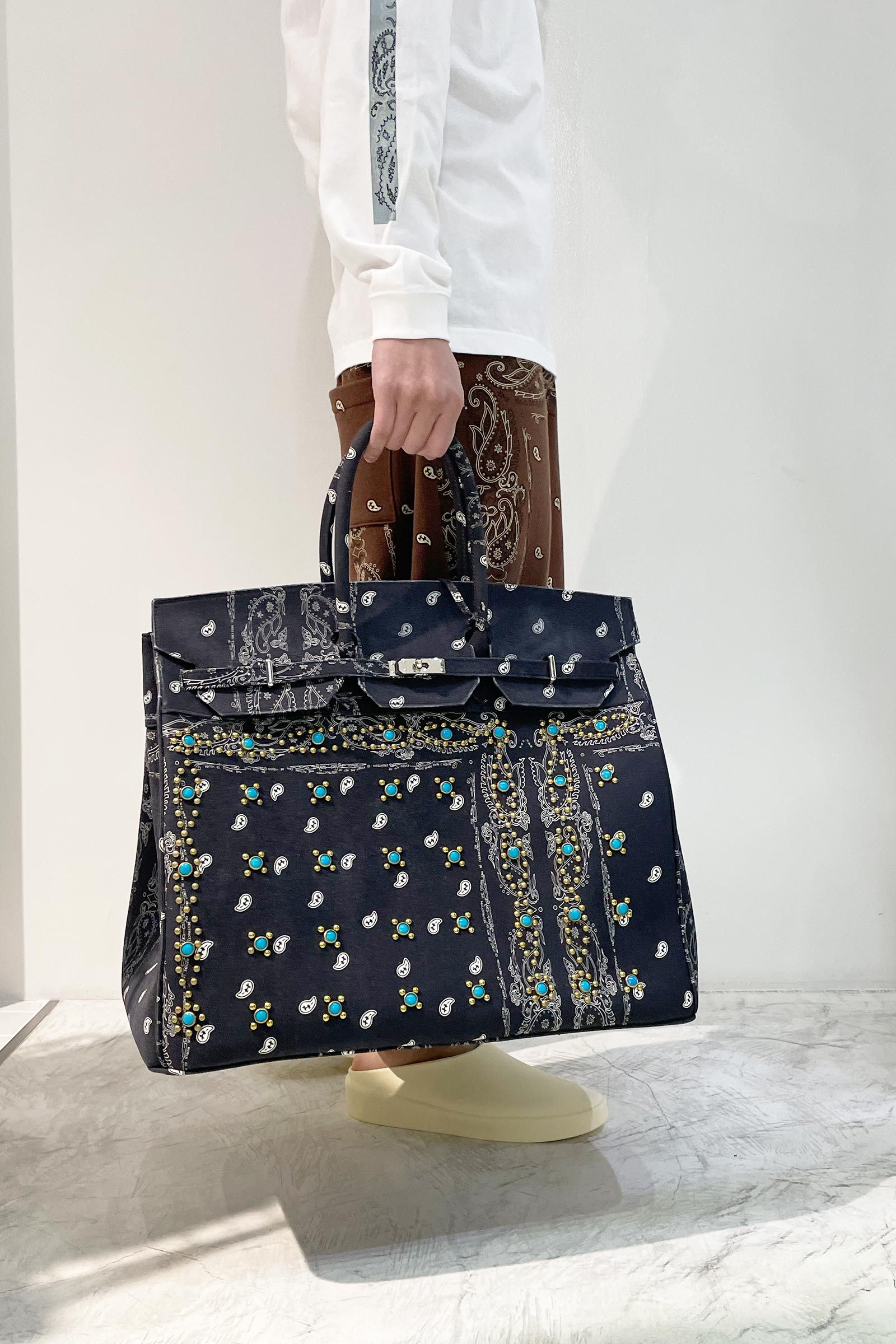 THE WORLD IS YOURS   別注BRIEF BAG  with studs   Detail
