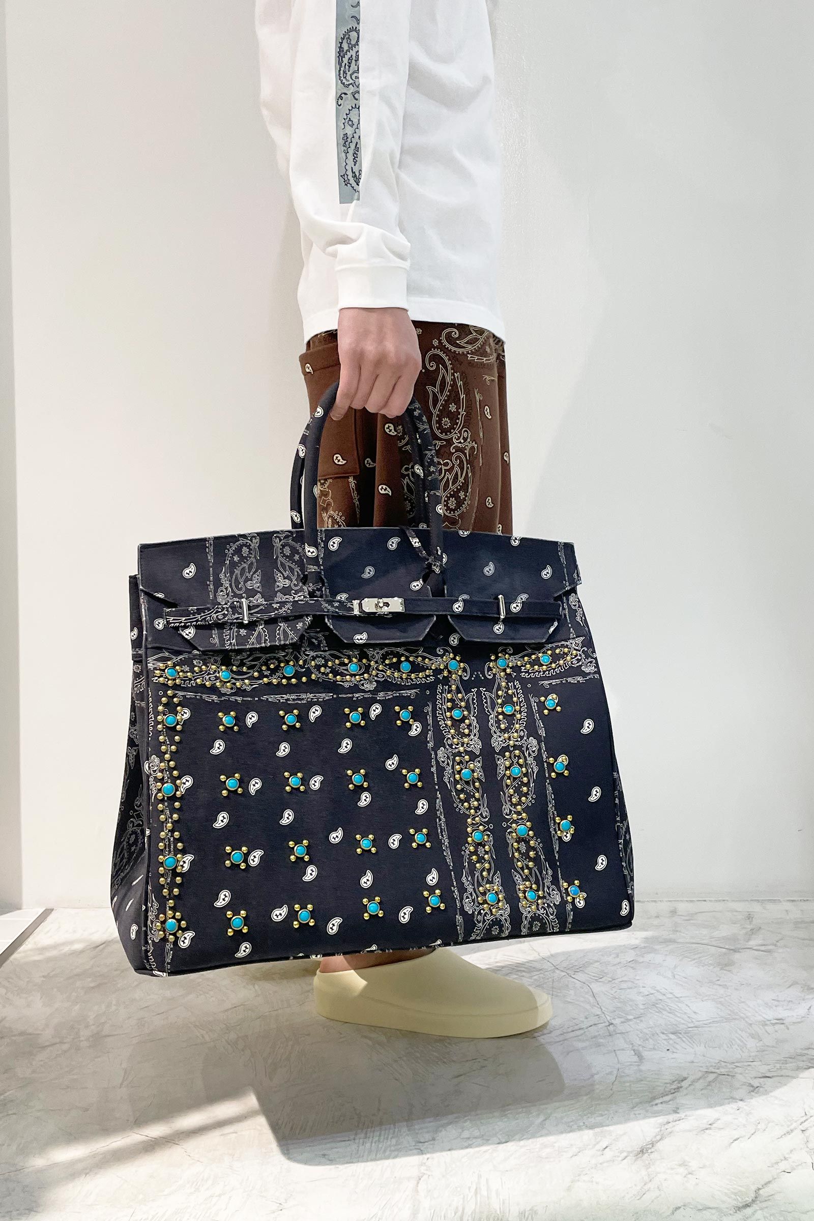 THE WORLD IS YOURS - 別注BRIEF BAG 50 with studs/2 | Detail