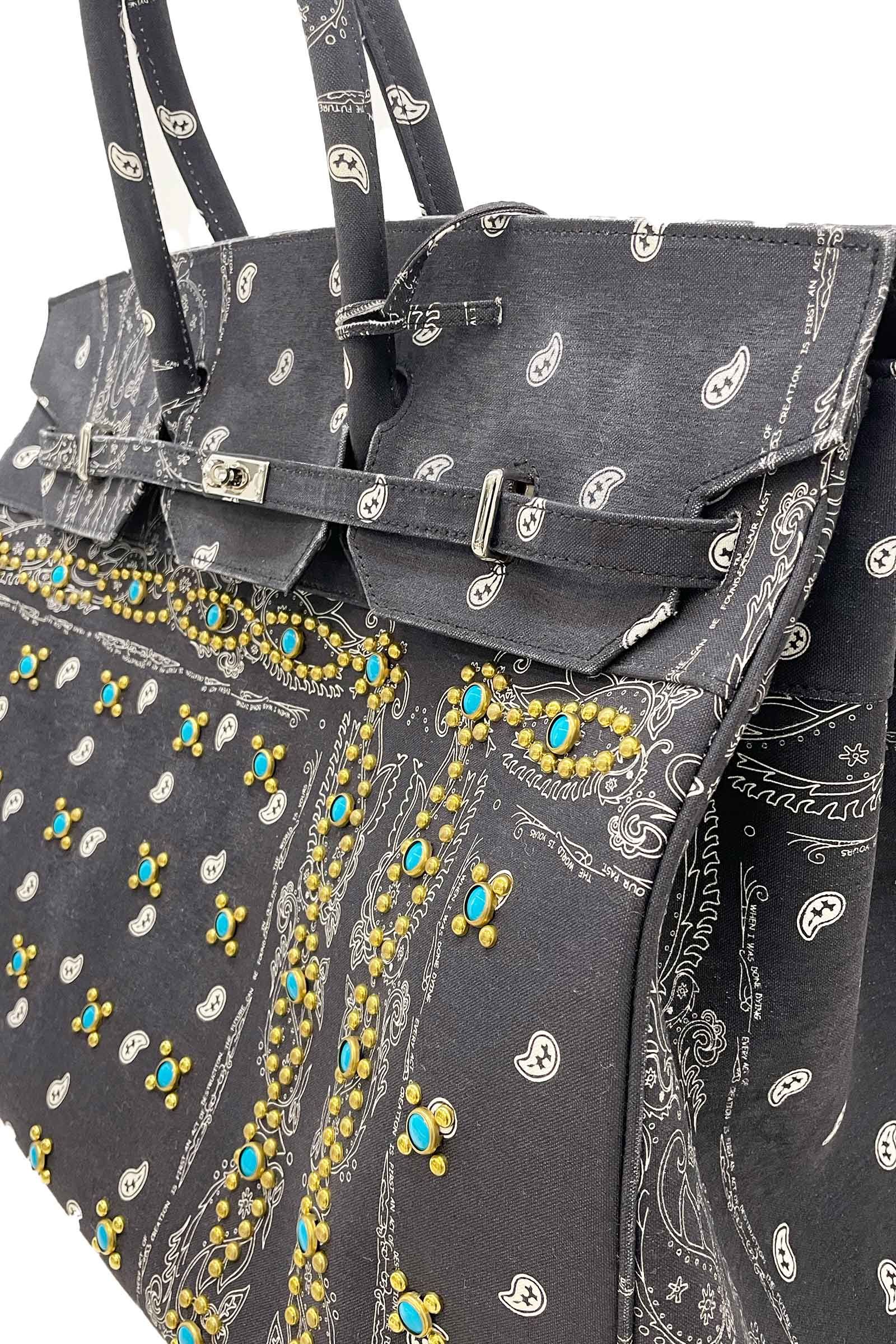 THE WORLD IS YOURS - 別注BRIEF BAG 50 with studs/2 | Detail