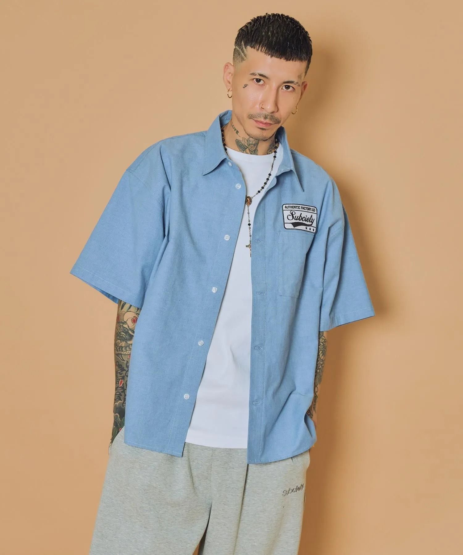 Square tail patch shirt