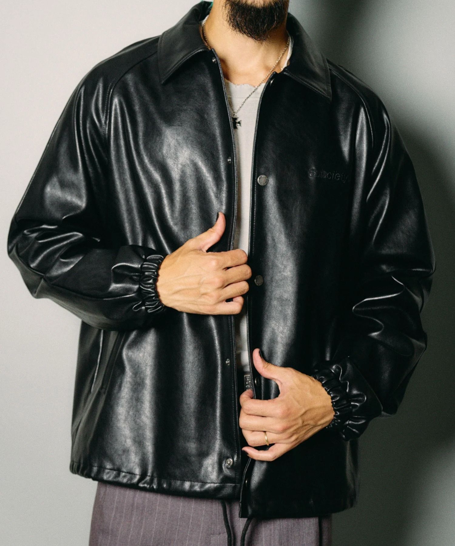 Faux leather coach jacket