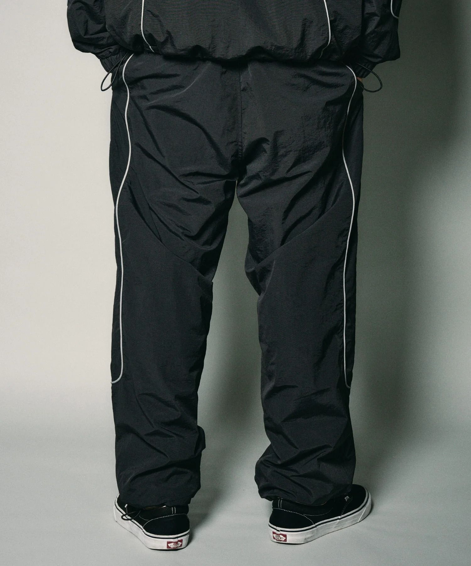 Reflective piping nylon pants