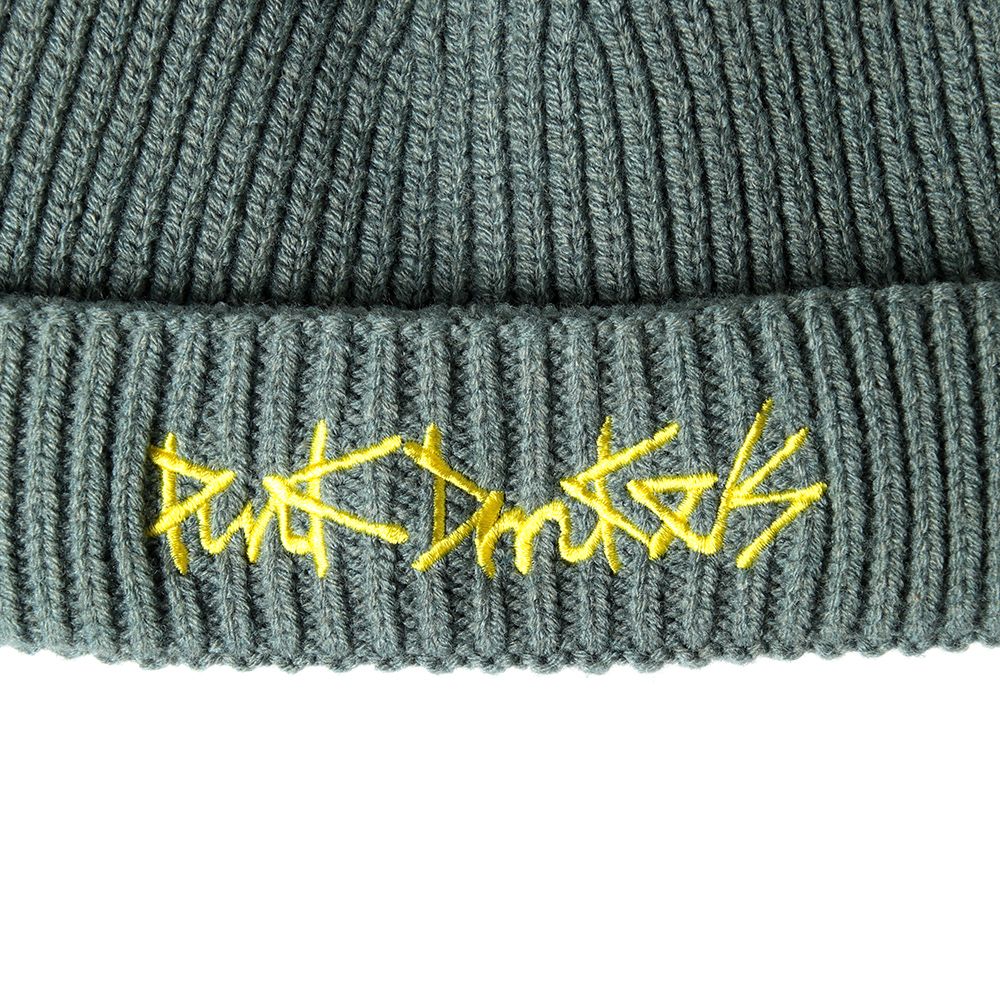 ペンで描いた様なロゴのニットCAP