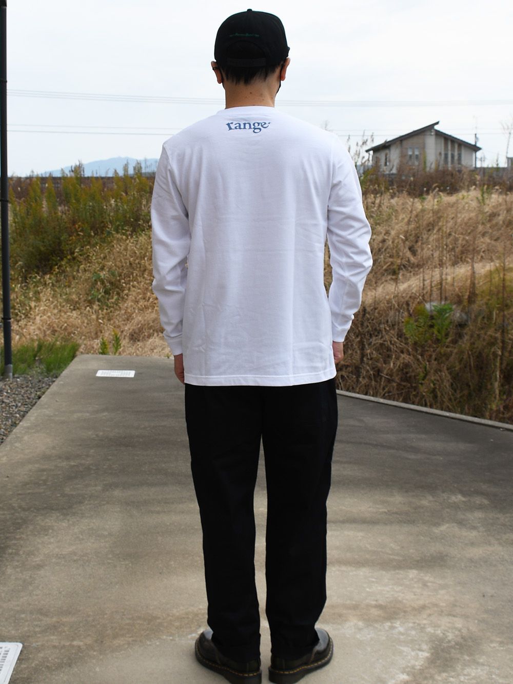Man with a red star LS tee