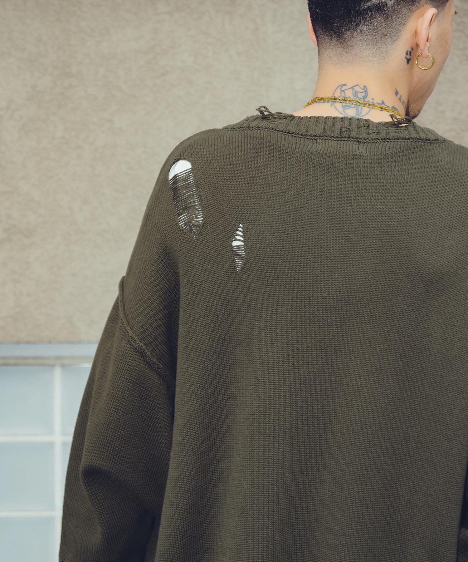 Damaged knit cardigan
